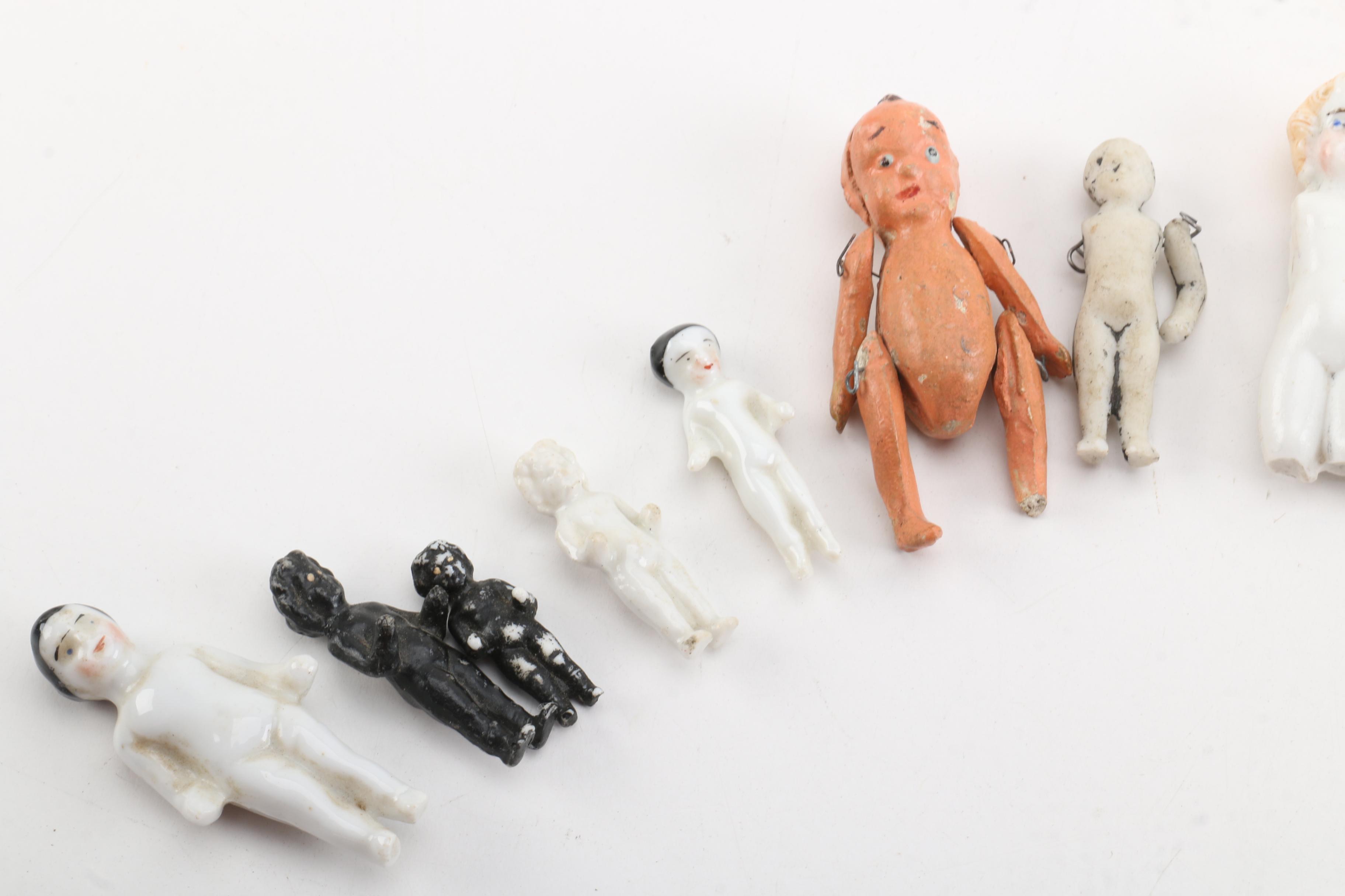 Antique Miniature Frozen and Pin-Jointed Porcelain Dolls