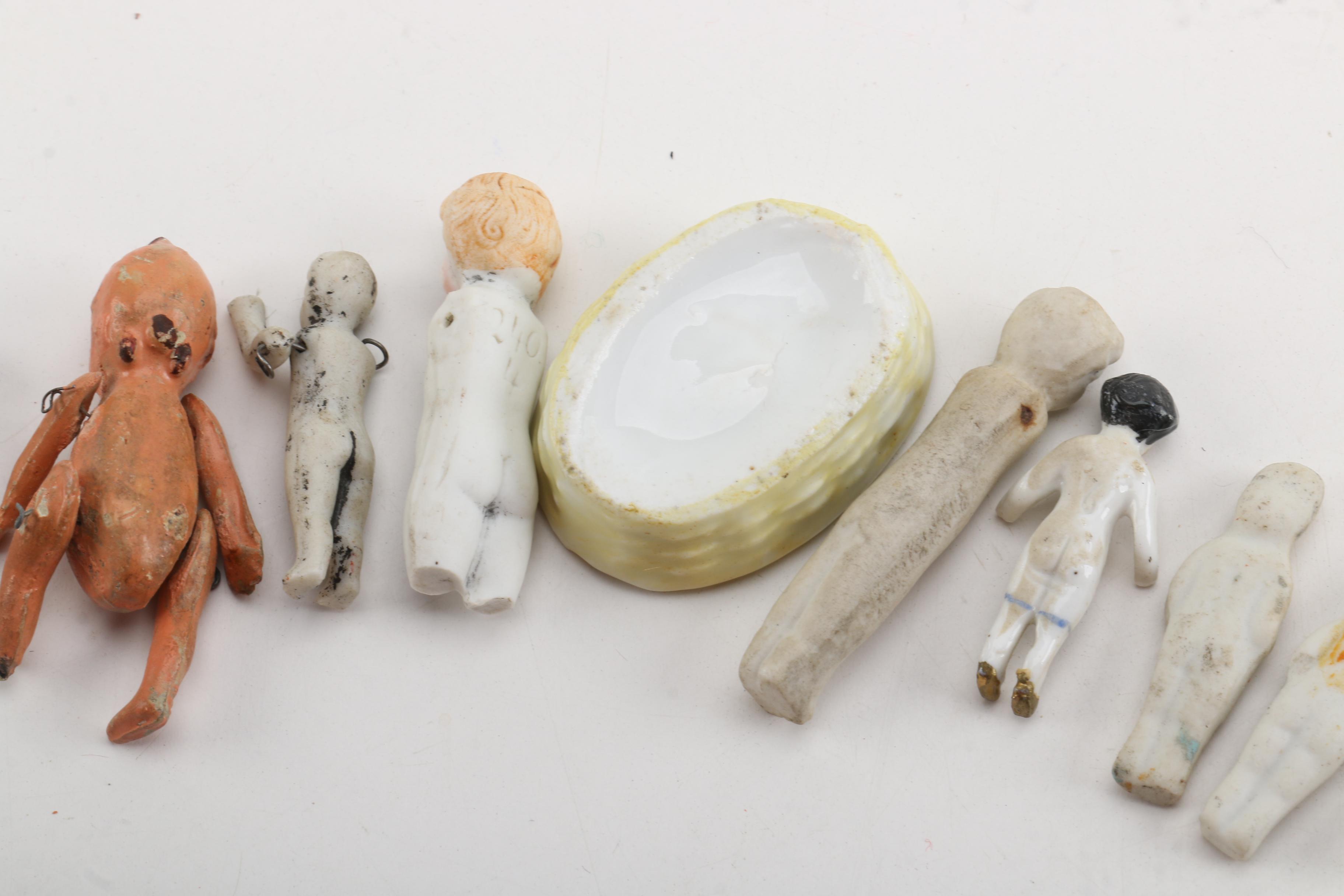 Antique Miniature Frozen and Pin-Jointed Porcelain Dolls