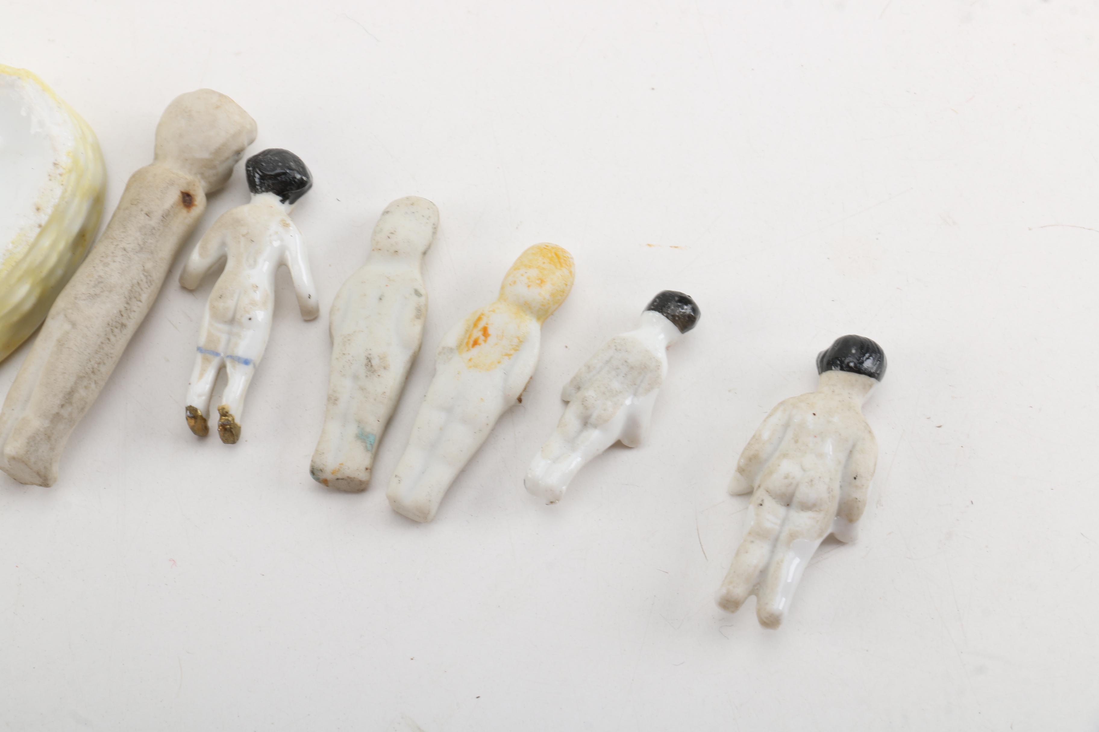 Antique Miniature Frozen and Pin-Jointed Porcelain Dolls