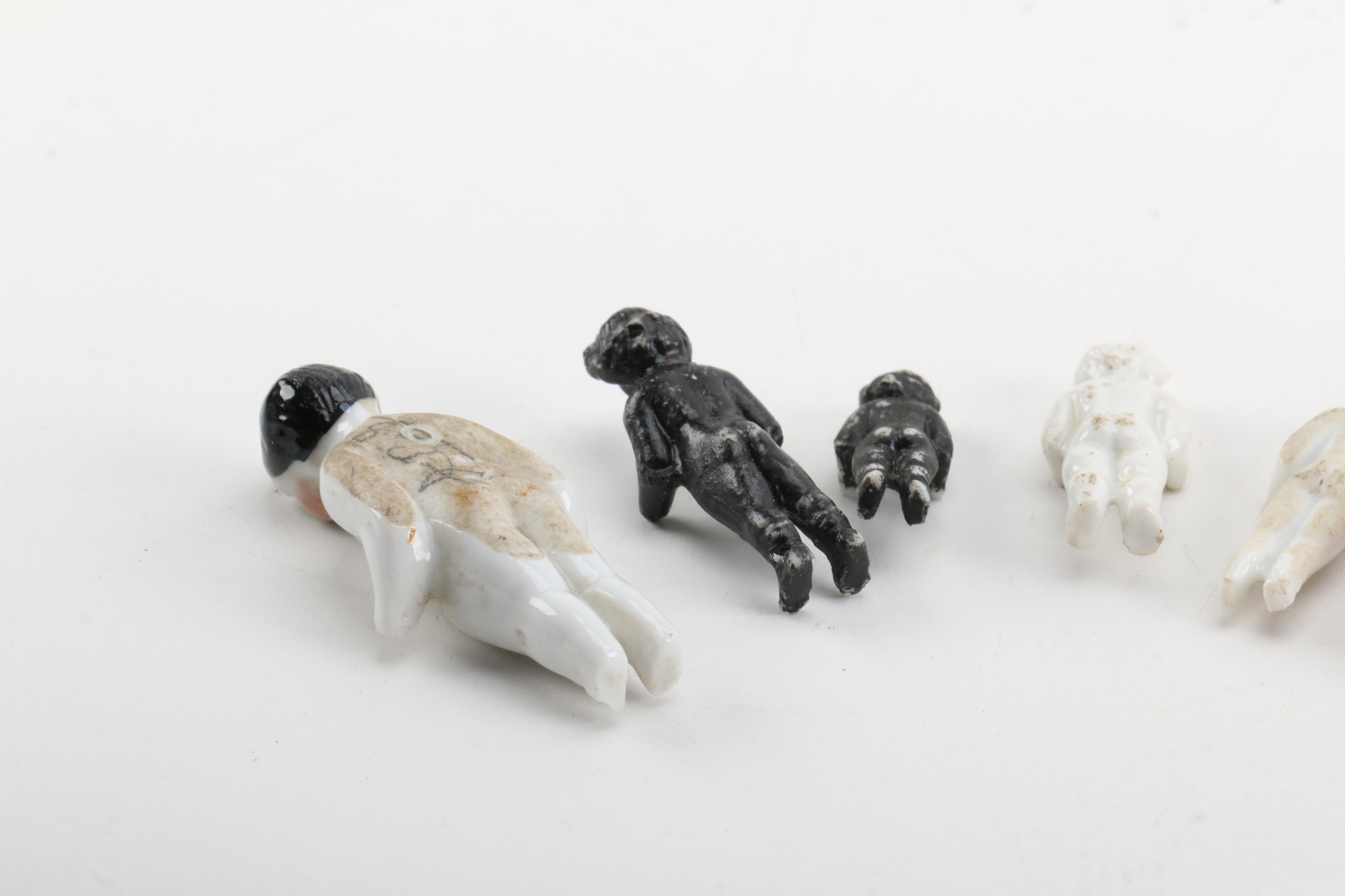 Antique Miniature Frozen and Pin-Jointed Porcelain Dolls