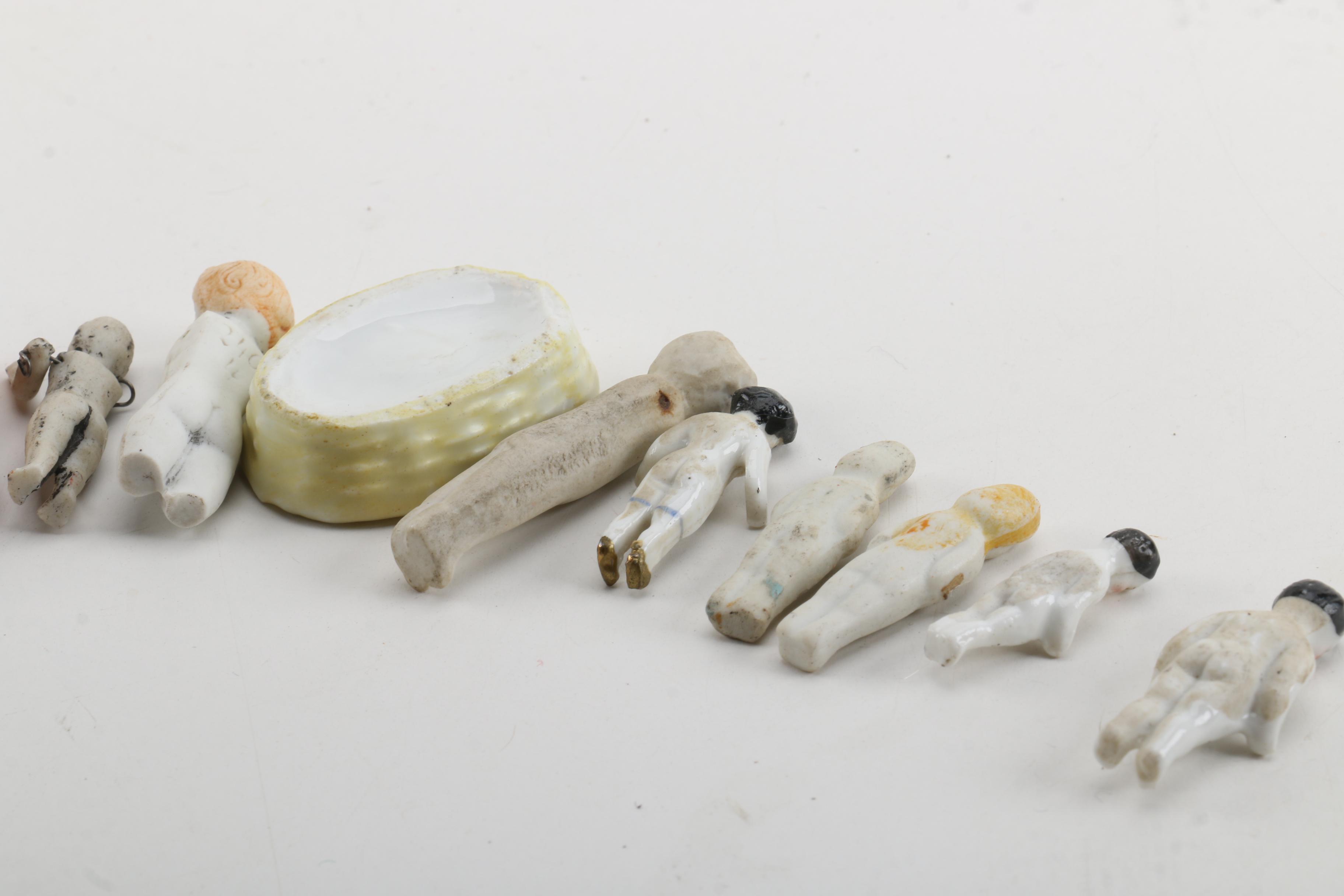 Antique Miniature Frozen and Pin-Jointed Porcelain Dolls