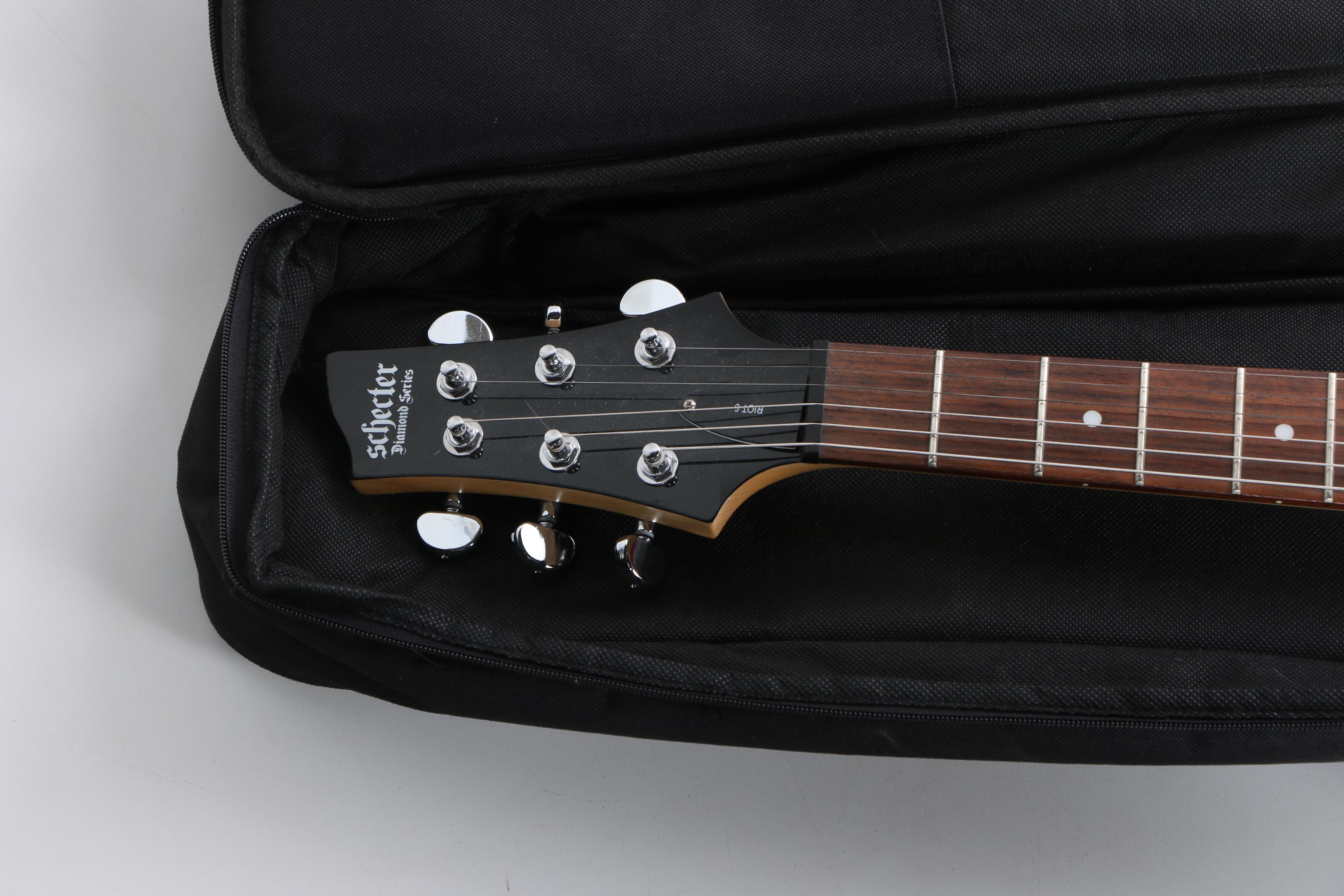 Schecter Diamond Series Riot 6 Electric Guitar in Red with Gig Bag