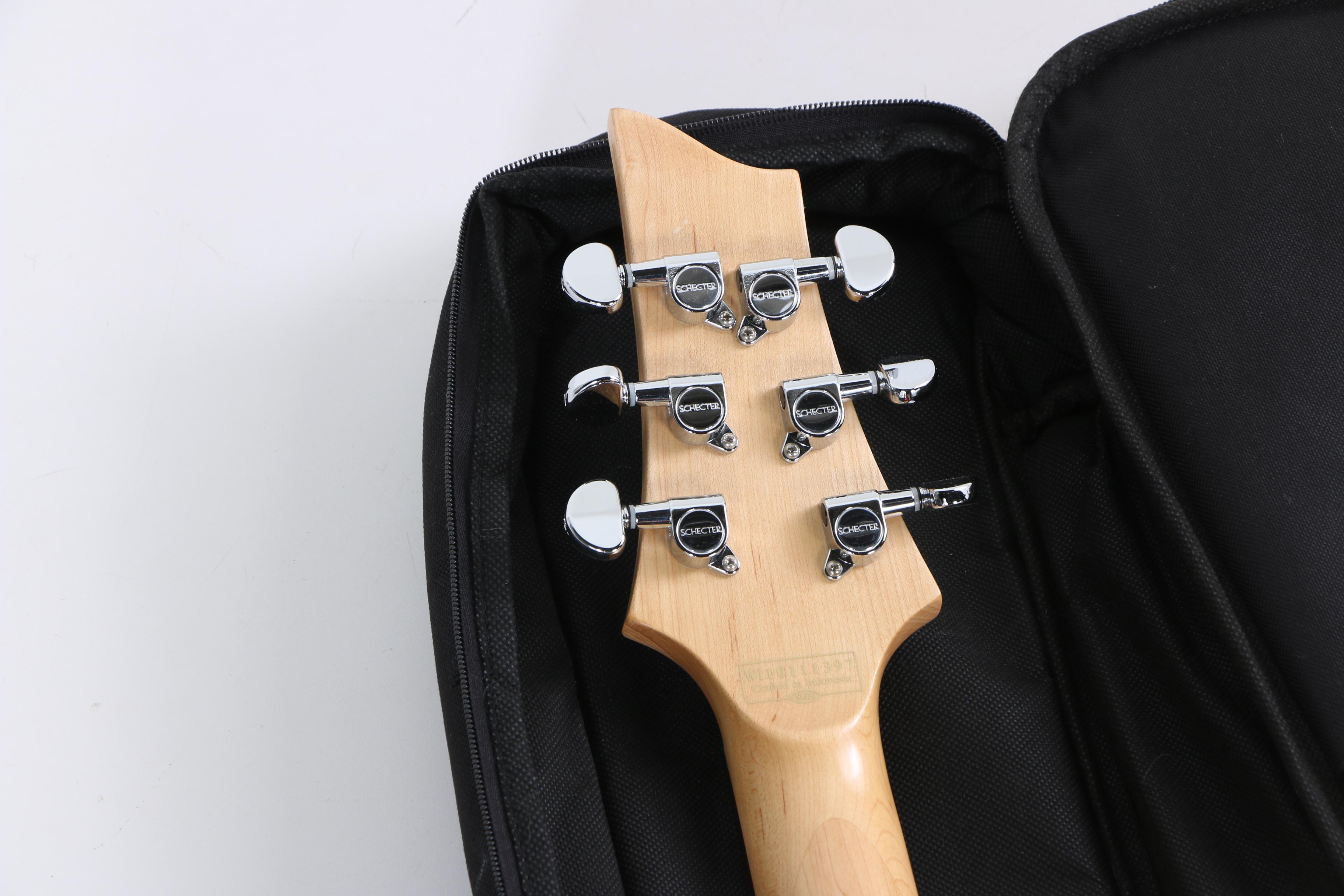 Schecter Diamond Series Riot 6 Electric Guitar in Red with Gig Bag