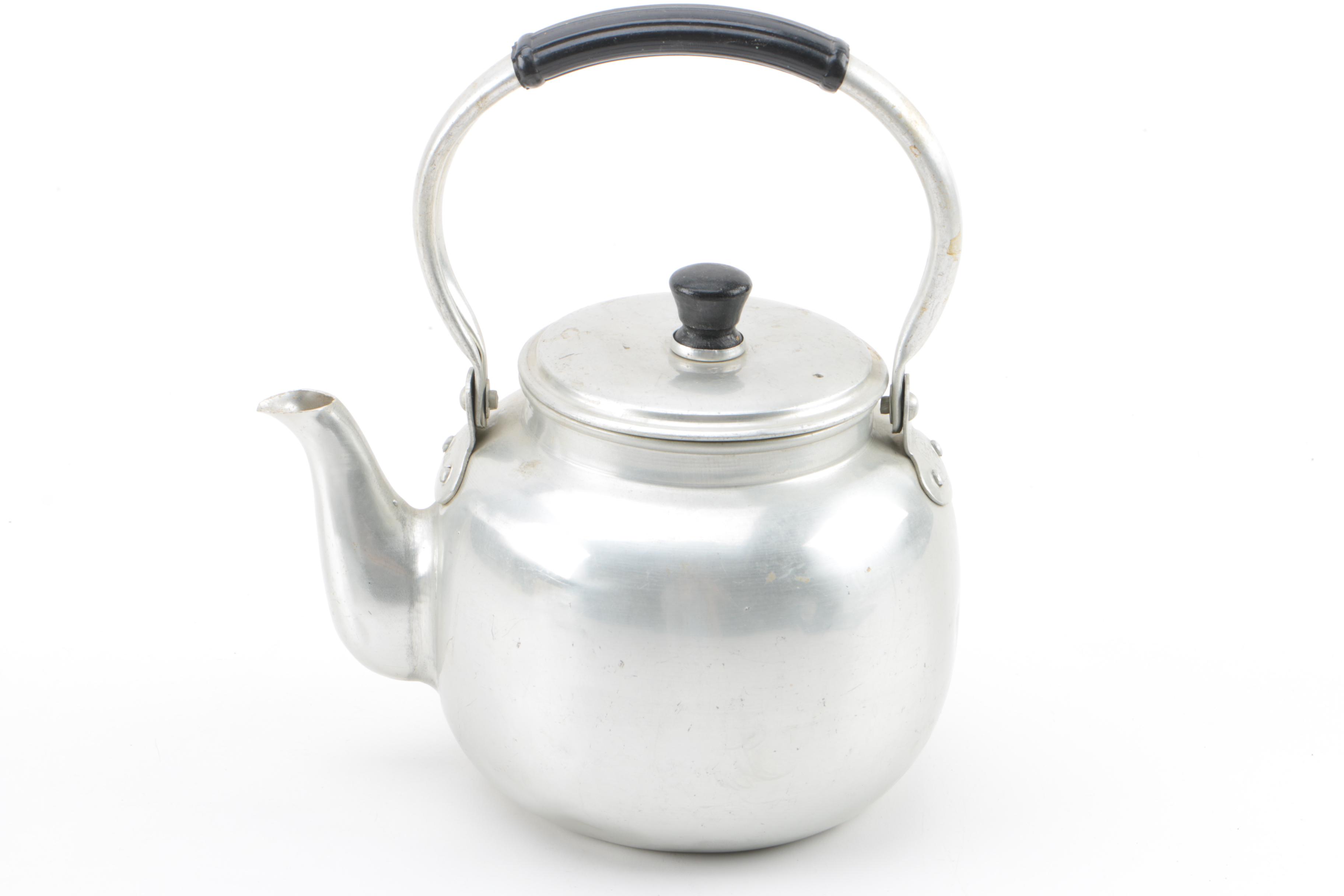 Metal Teapots and Ceramic Cups