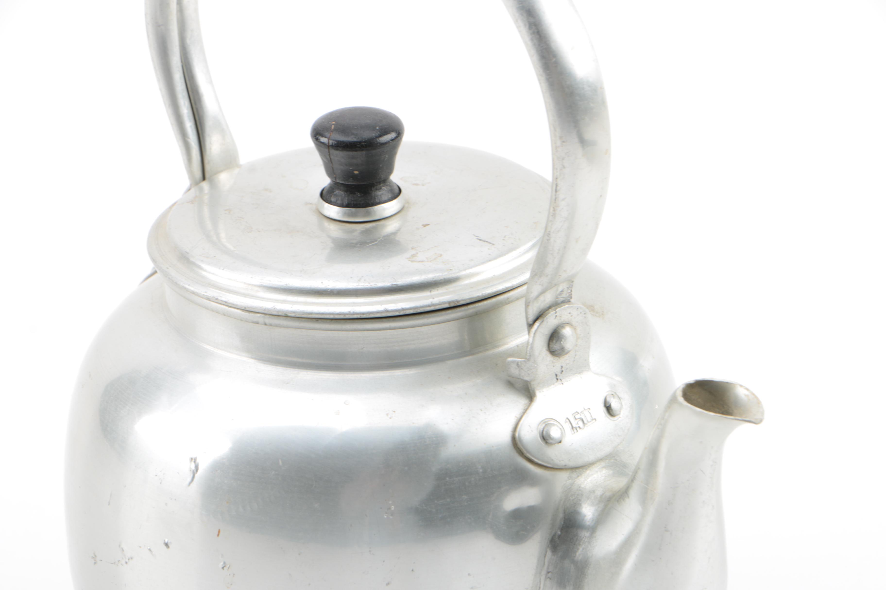 Metal Teapots and Ceramic Cups