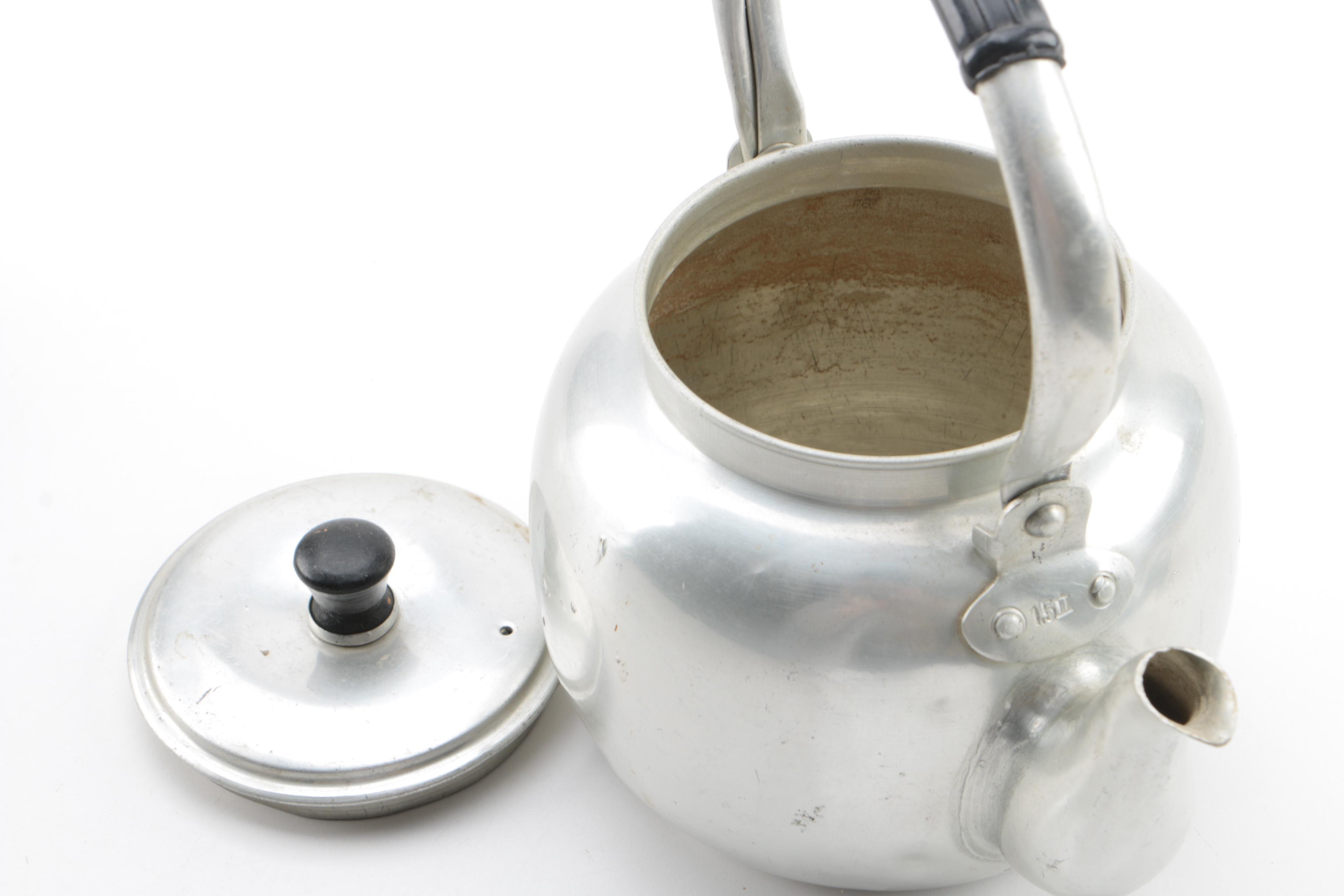 Metal Teapots and Ceramic Cups
