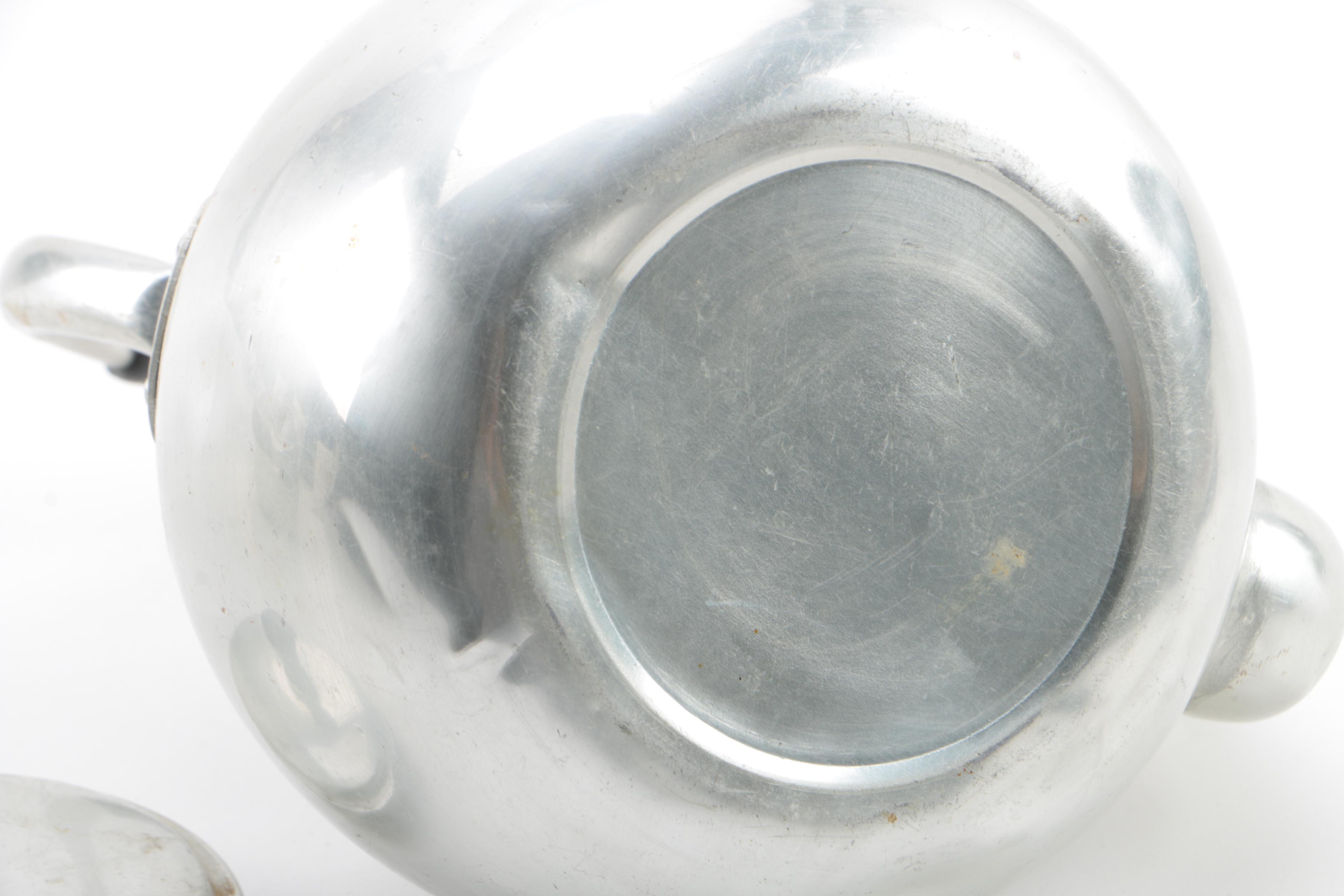 Metal Teapots and Ceramic Cups