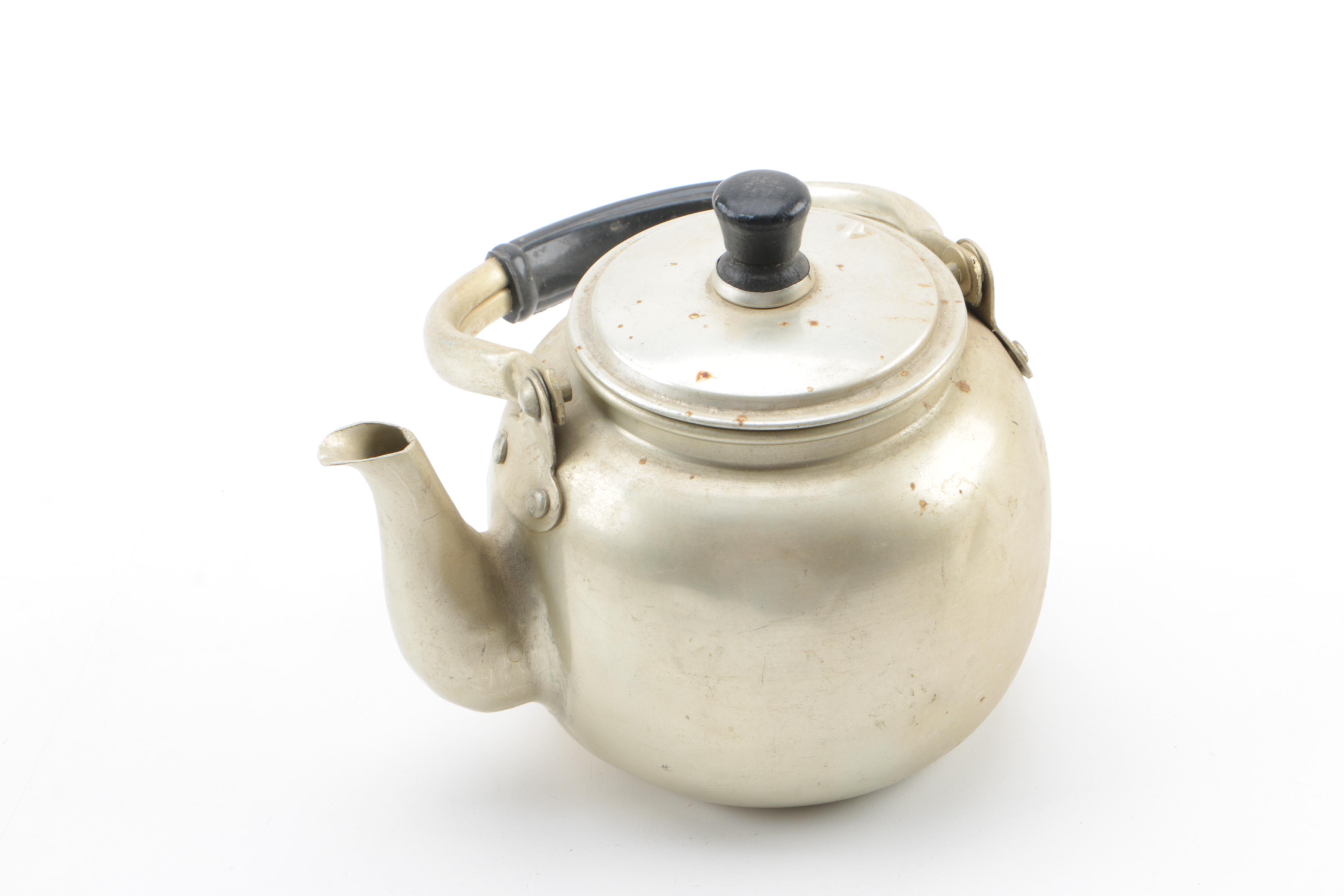 Metal Teapots and Ceramic Cups