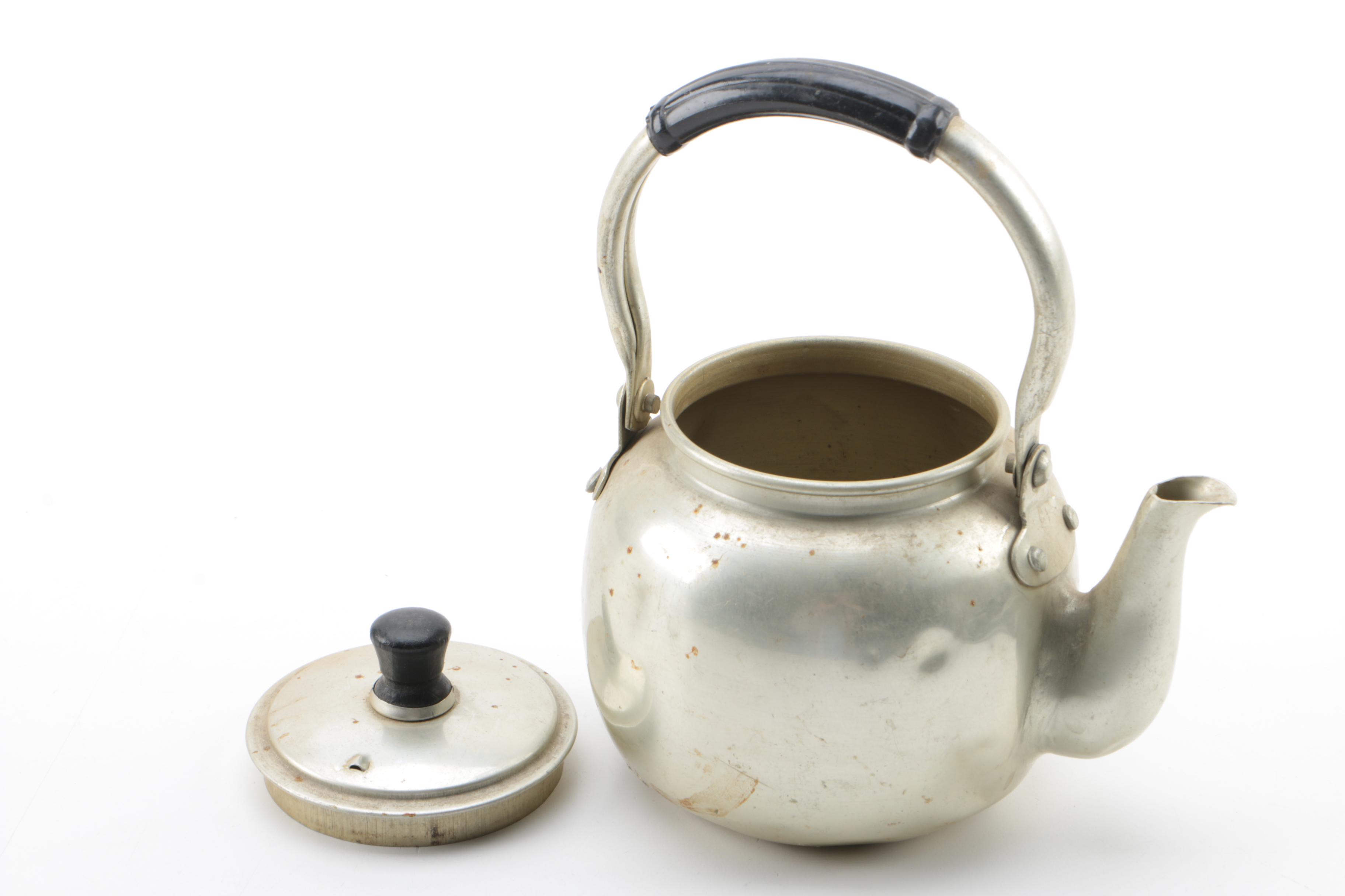 Metal Teapots and Ceramic Cups