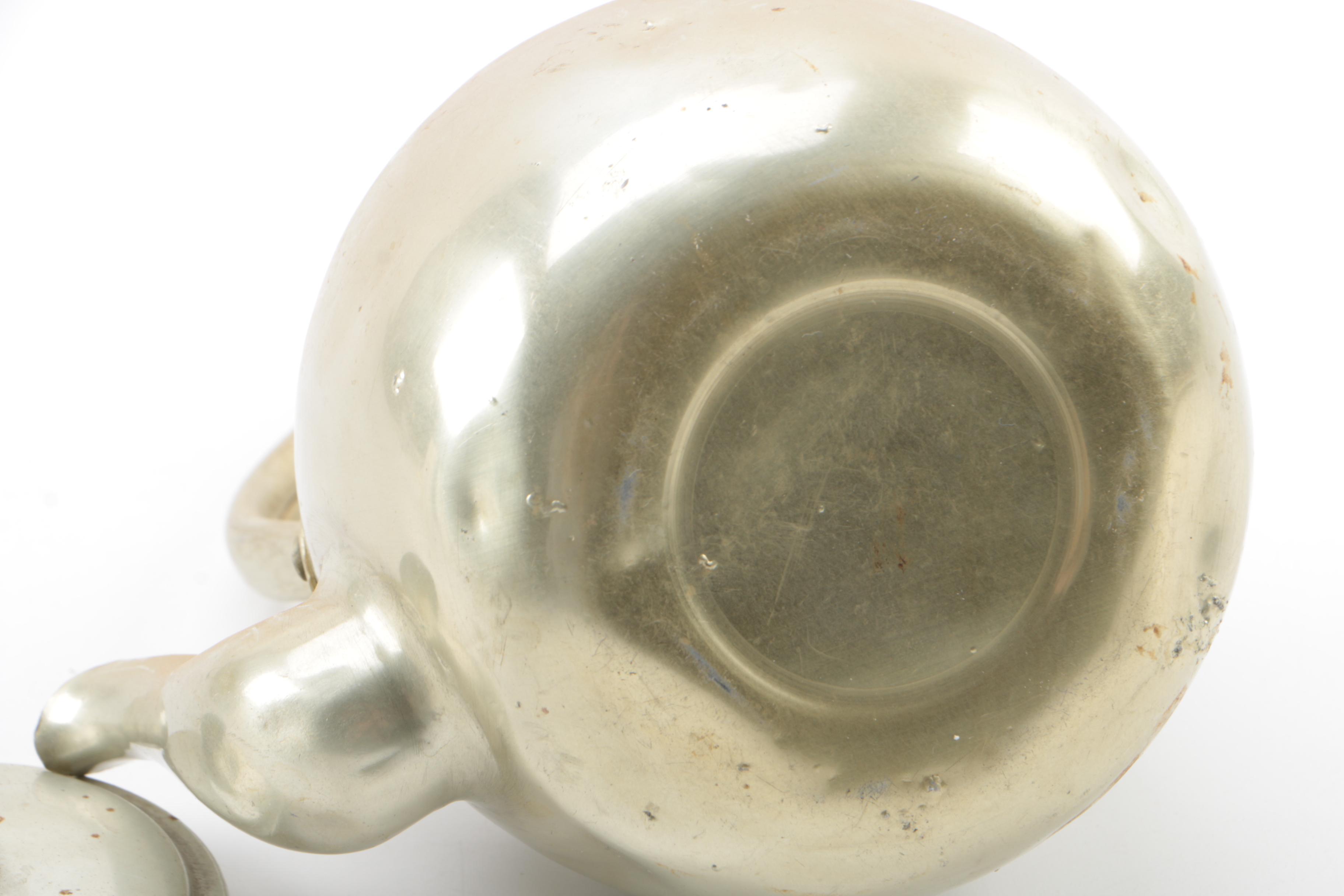 Metal Teapots and Ceramic Cups