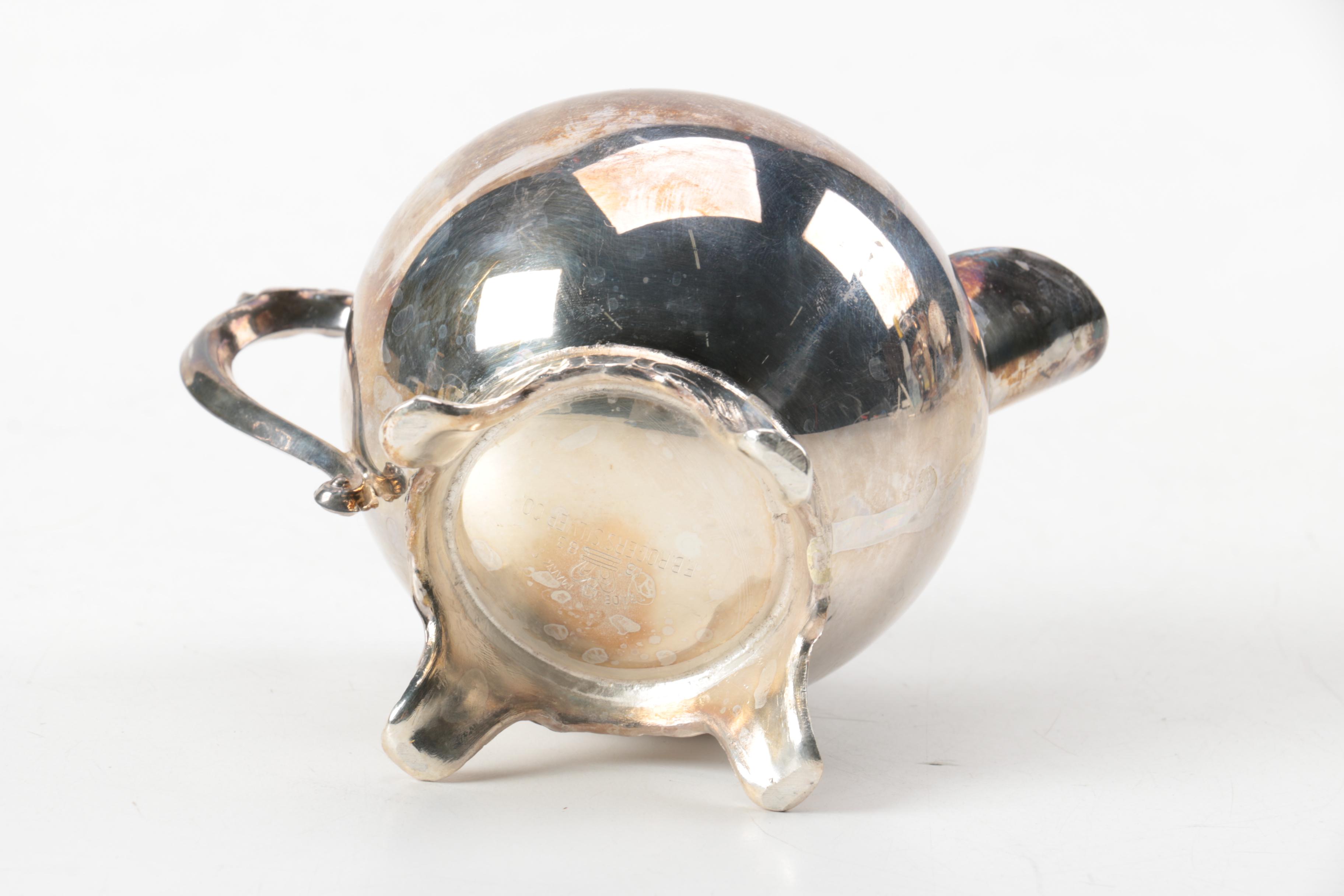 F.B. Rogers Silver Plate Creamer with Other Silver Plate Serveware