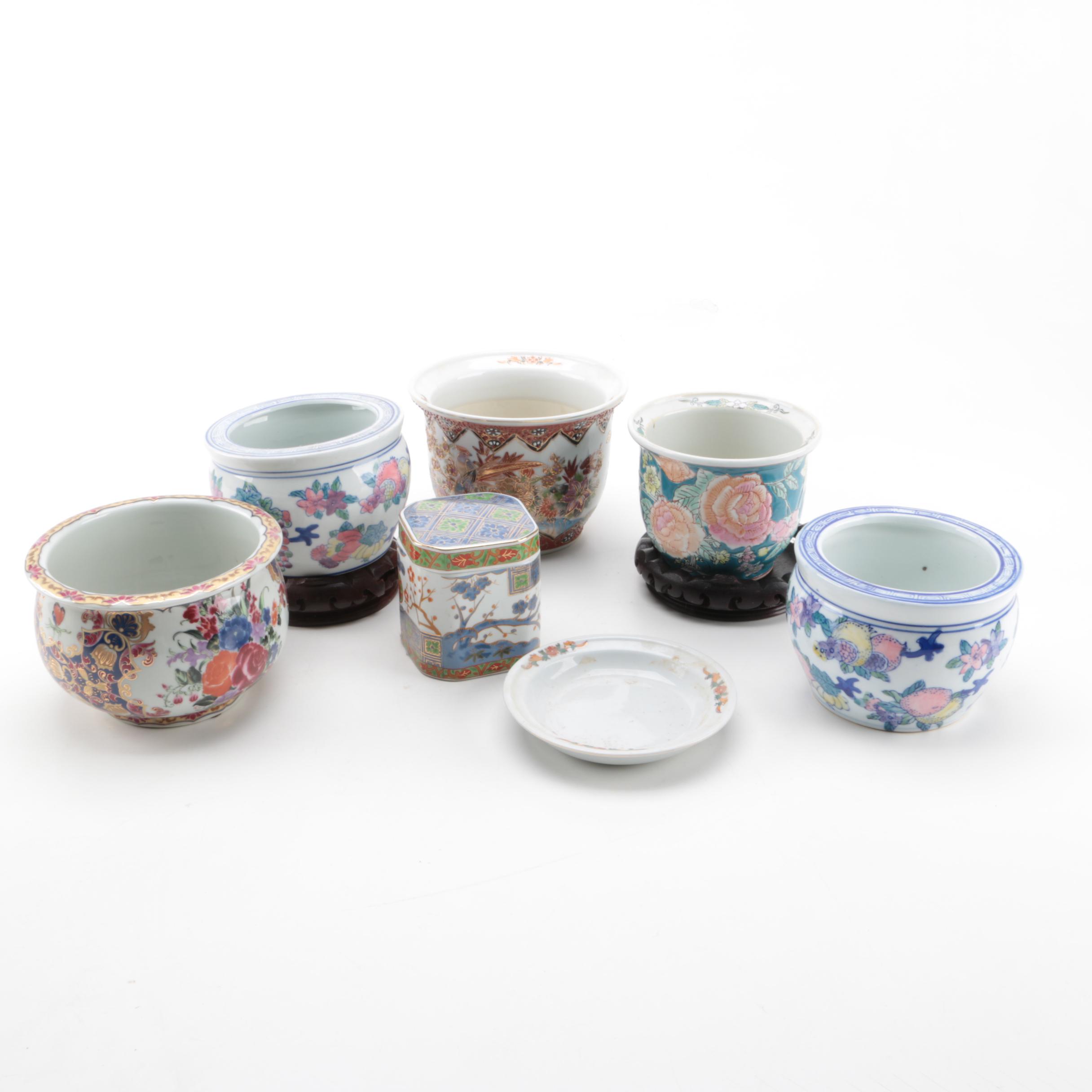 East Asian Porcelain Planters, Canister, Plate, and Carved Wood Stands