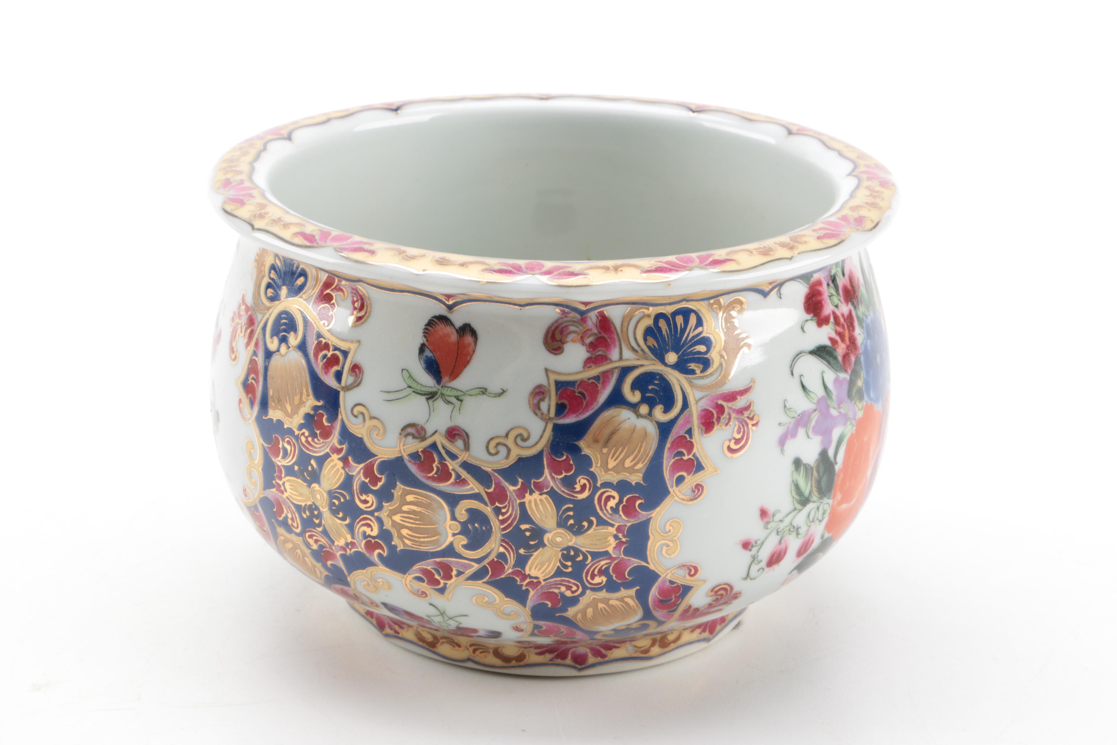 East Asian Porcelain Planters, Canister, Plate, and Carved Wood Stands