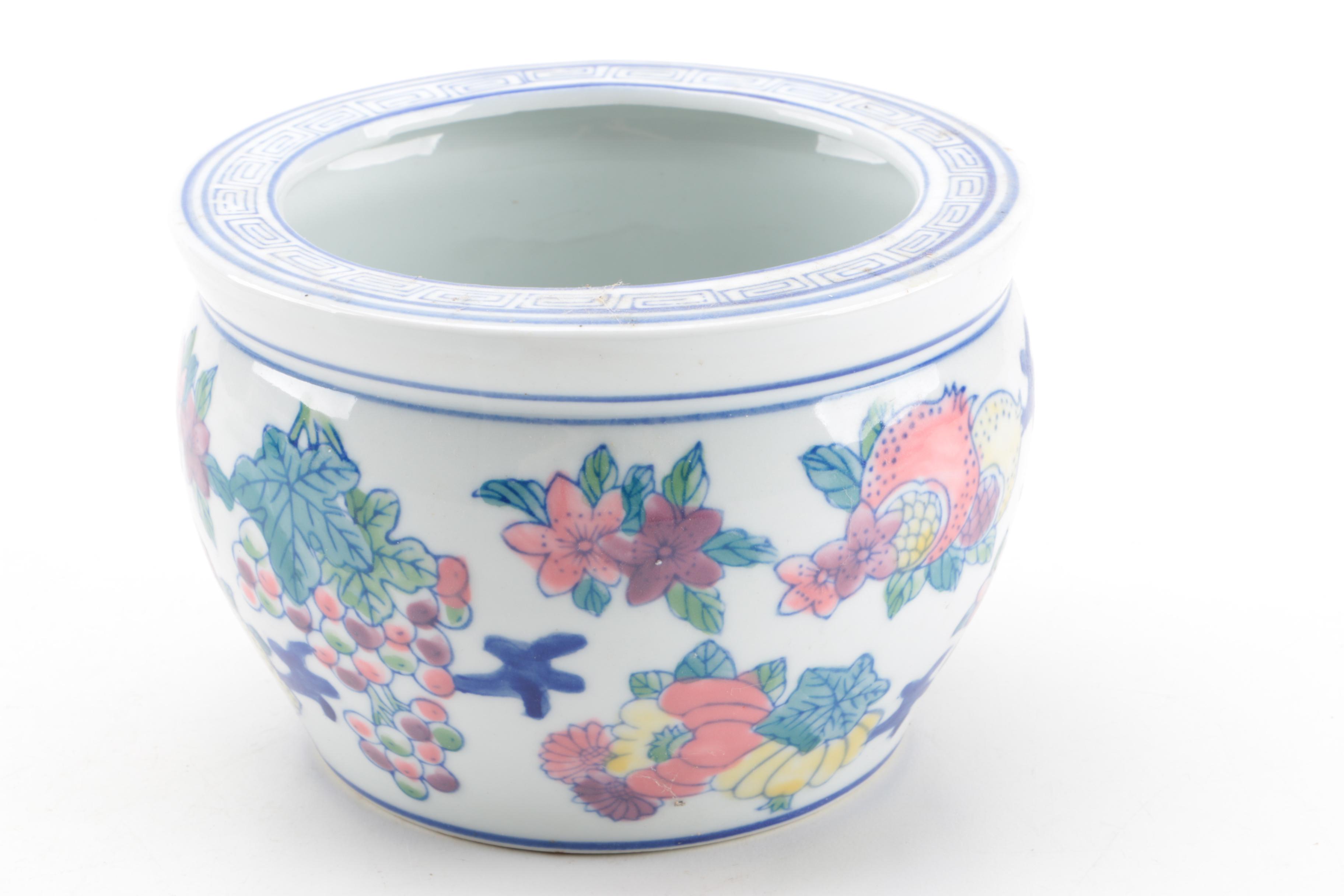 East Asian Porcelain Planters, Canister, Plate, and Carved Wood Stands