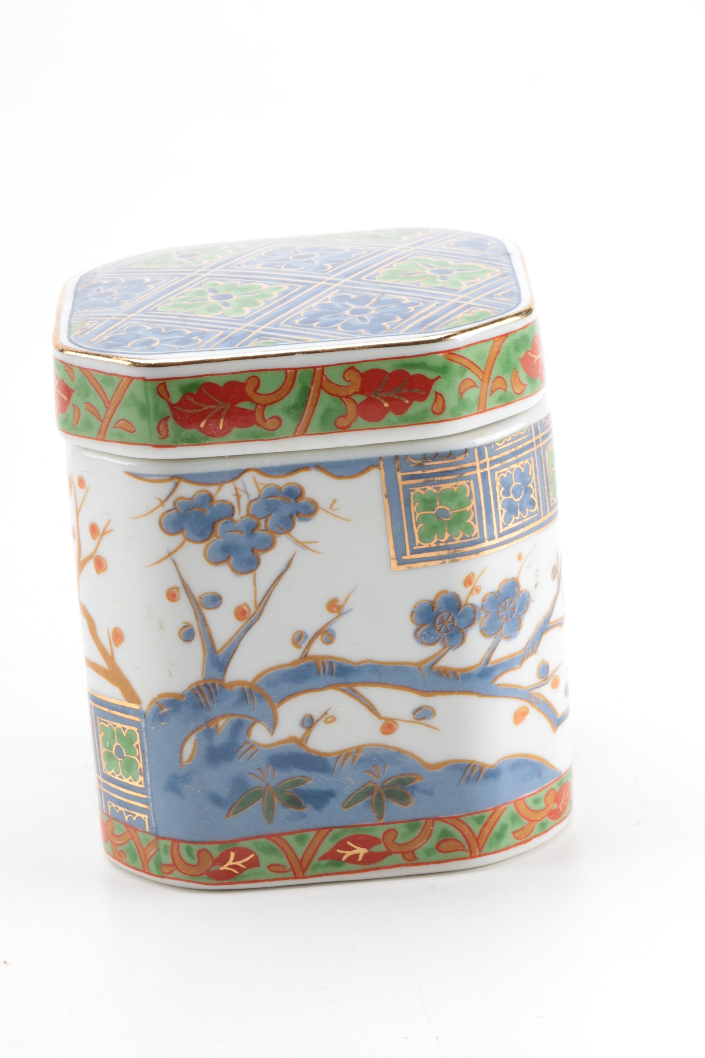 East Asian Porcelain Planters, Canister, Plate, and Carved Wood Stands