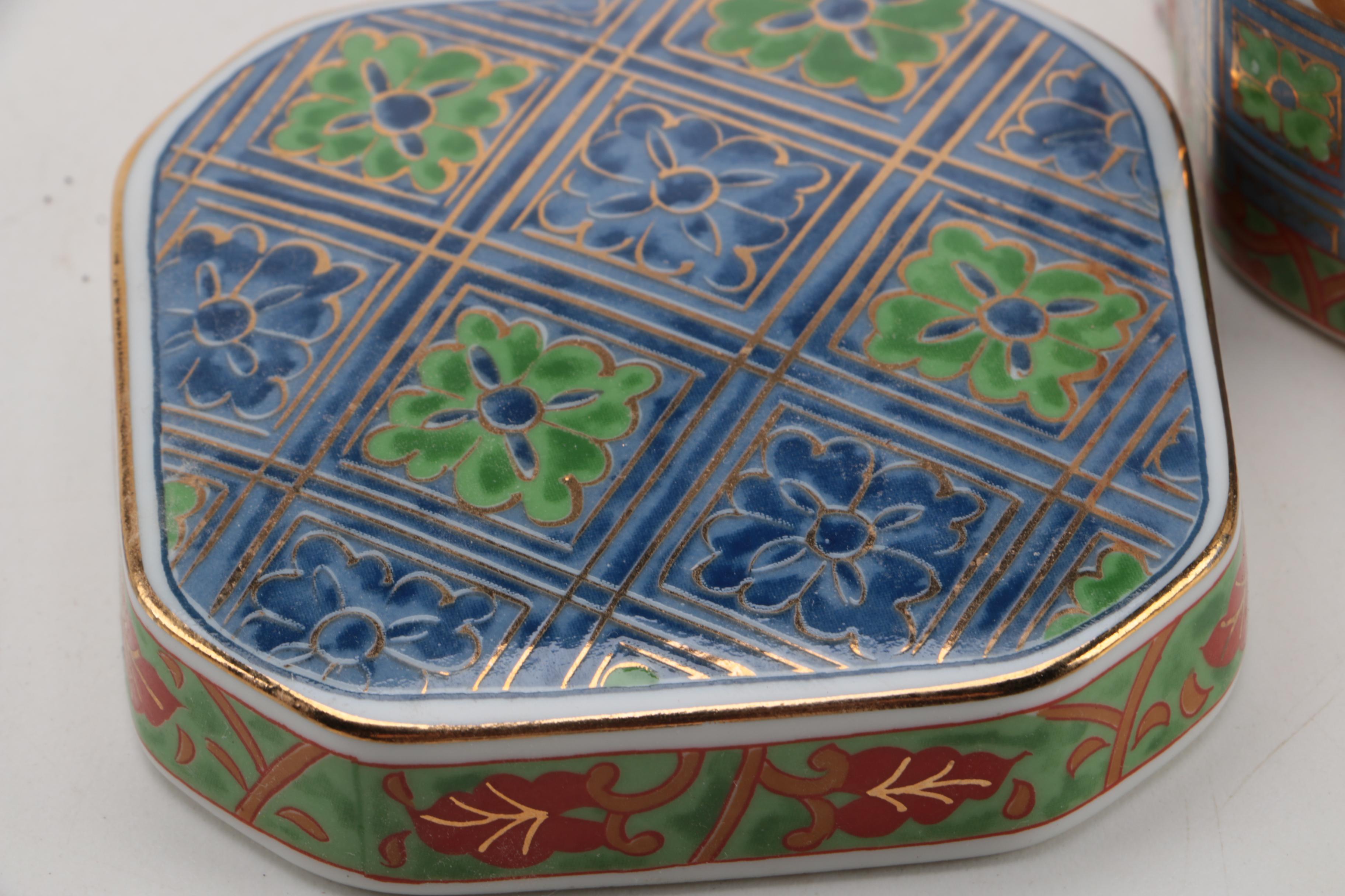 East Asian Porcelain Planters, Canister, Plate, and Carved Wood Stands