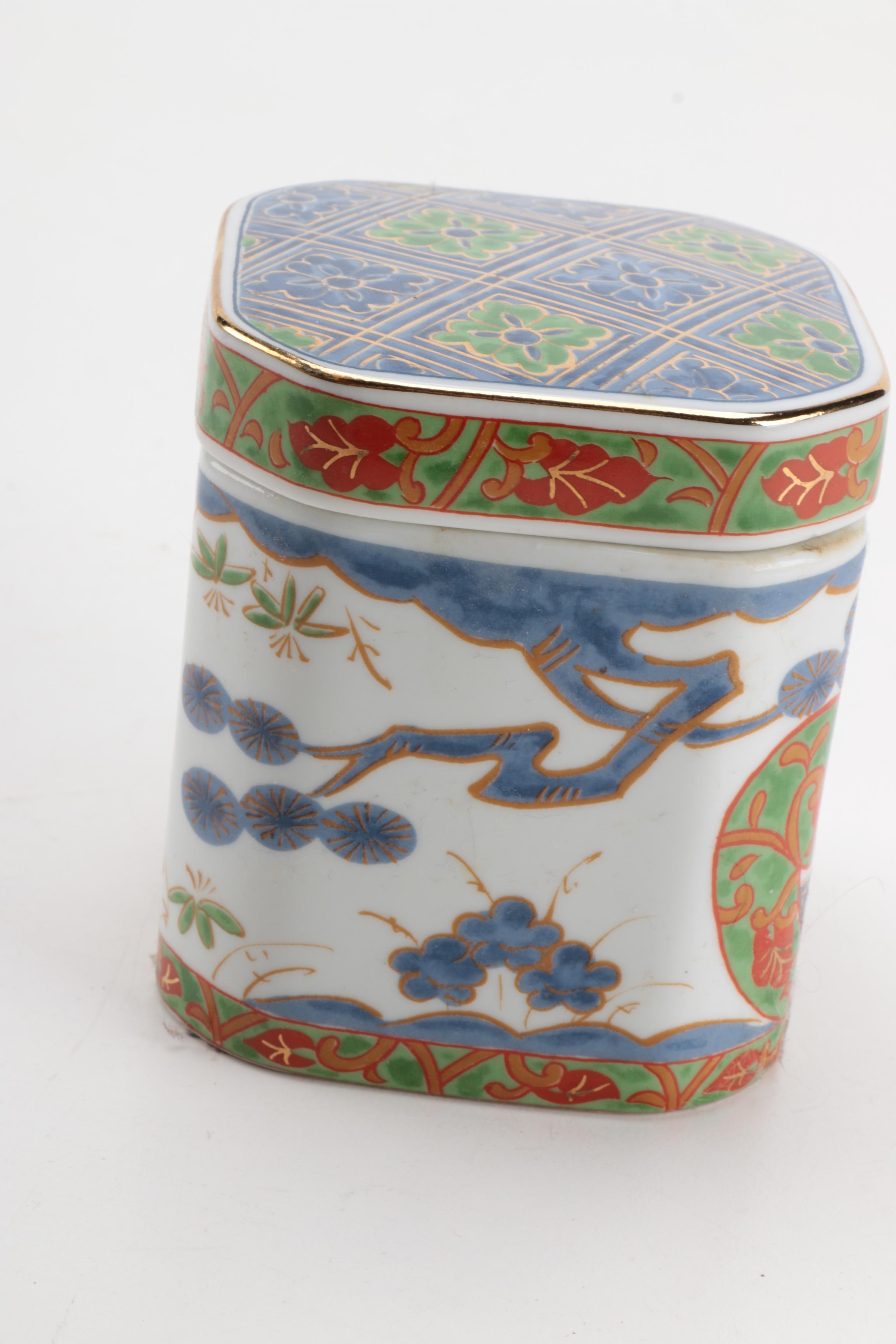 East Asian Porcelain Planters, Canister, Plate, and Carved Wood Stands