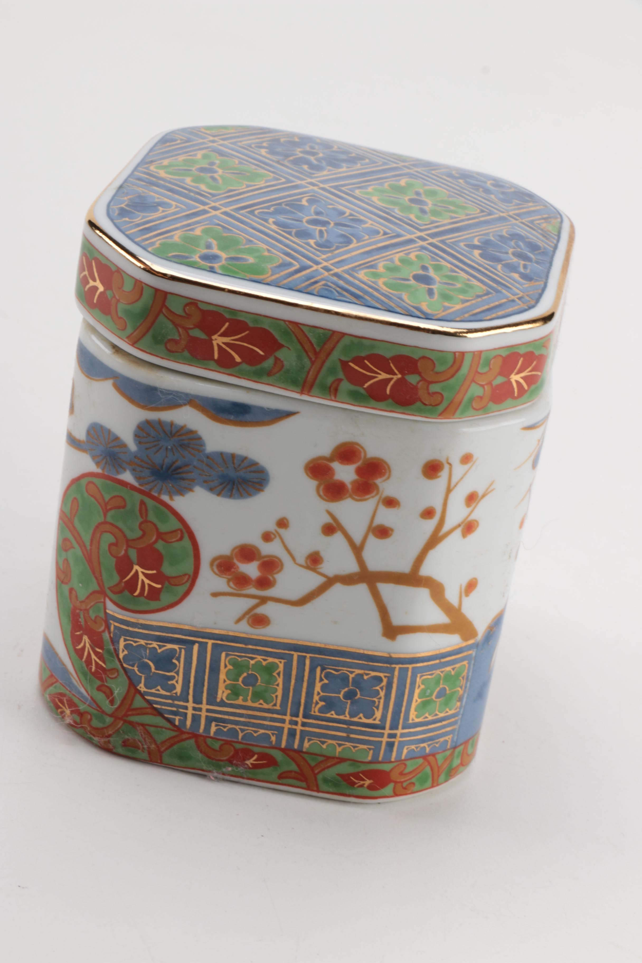 East Asian Porcelain Planters, Canister, Plate, and Carved Wood Stands