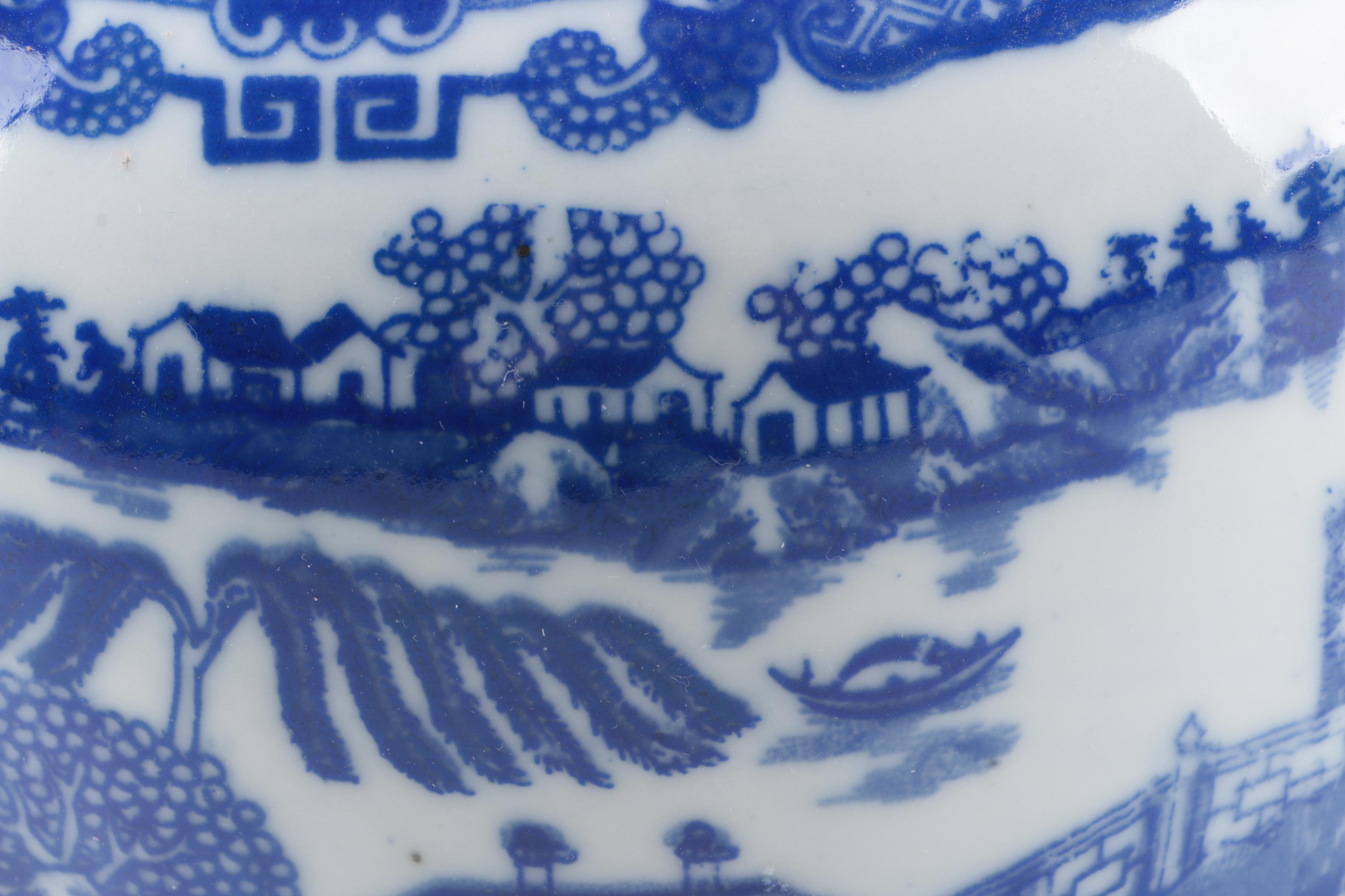 Blue and White Ceramic Lidded Containers and Vase