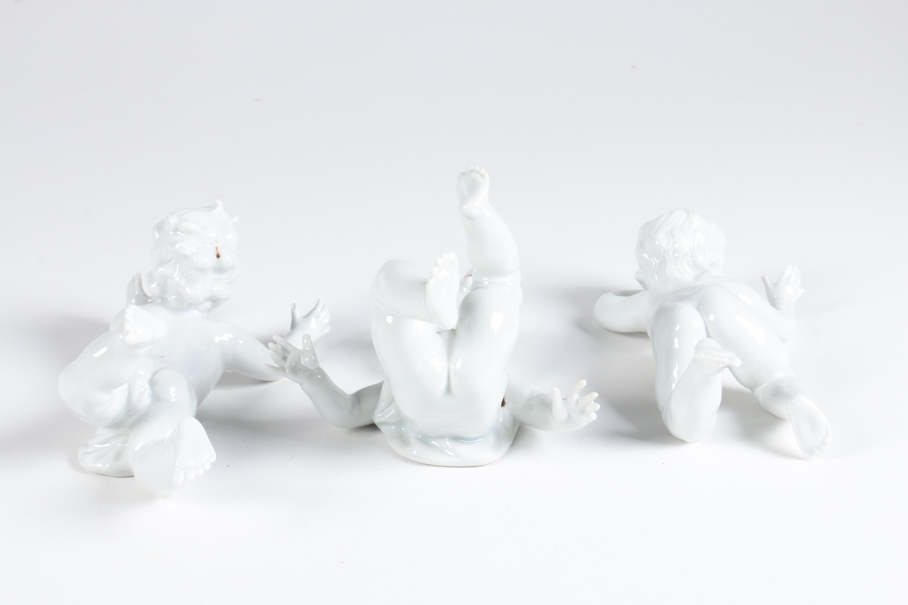 Porcelain Tumbling Cherub Figurines Featuring Unterweissbach