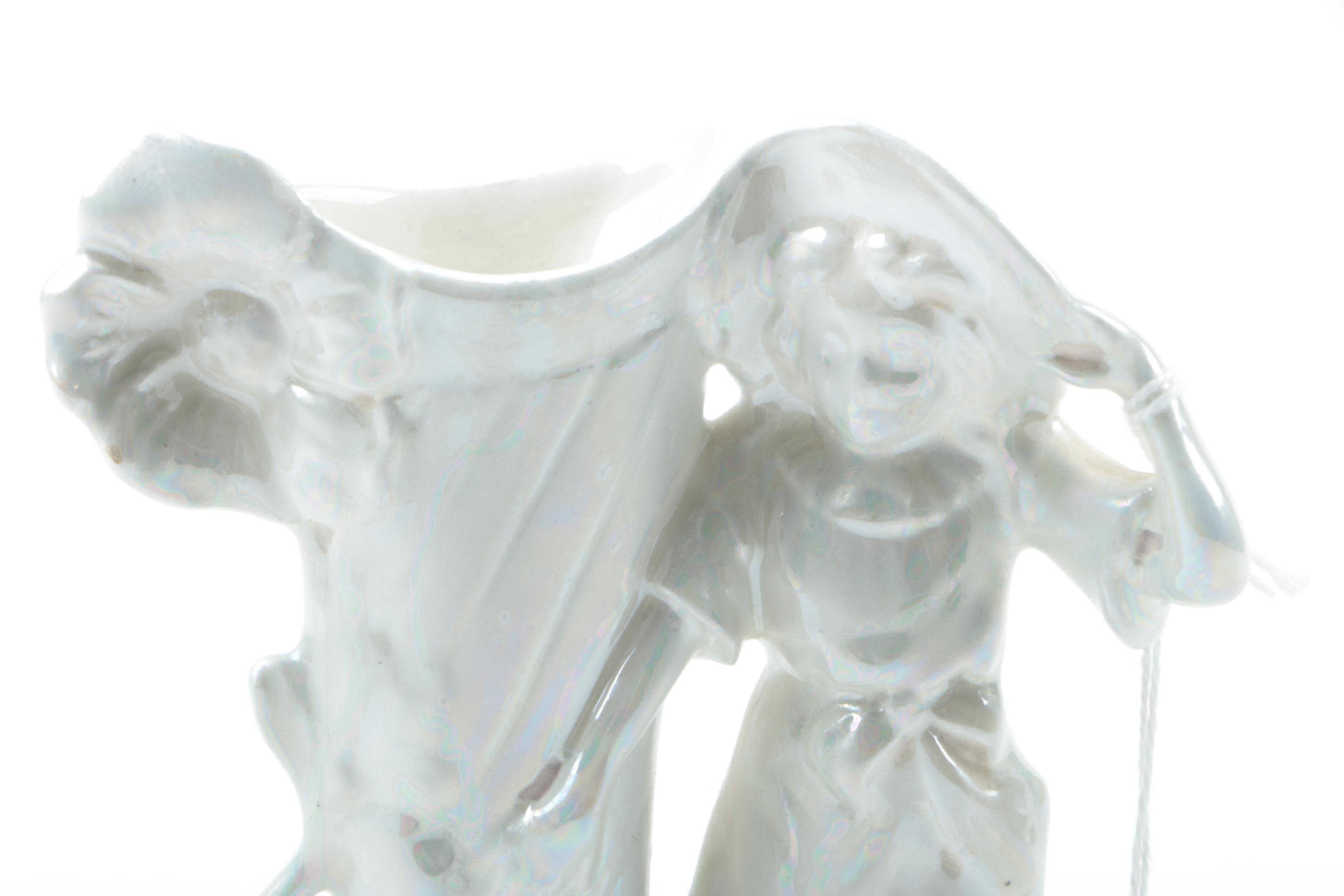 Pearlescent Porcelain Figural Spill Vases