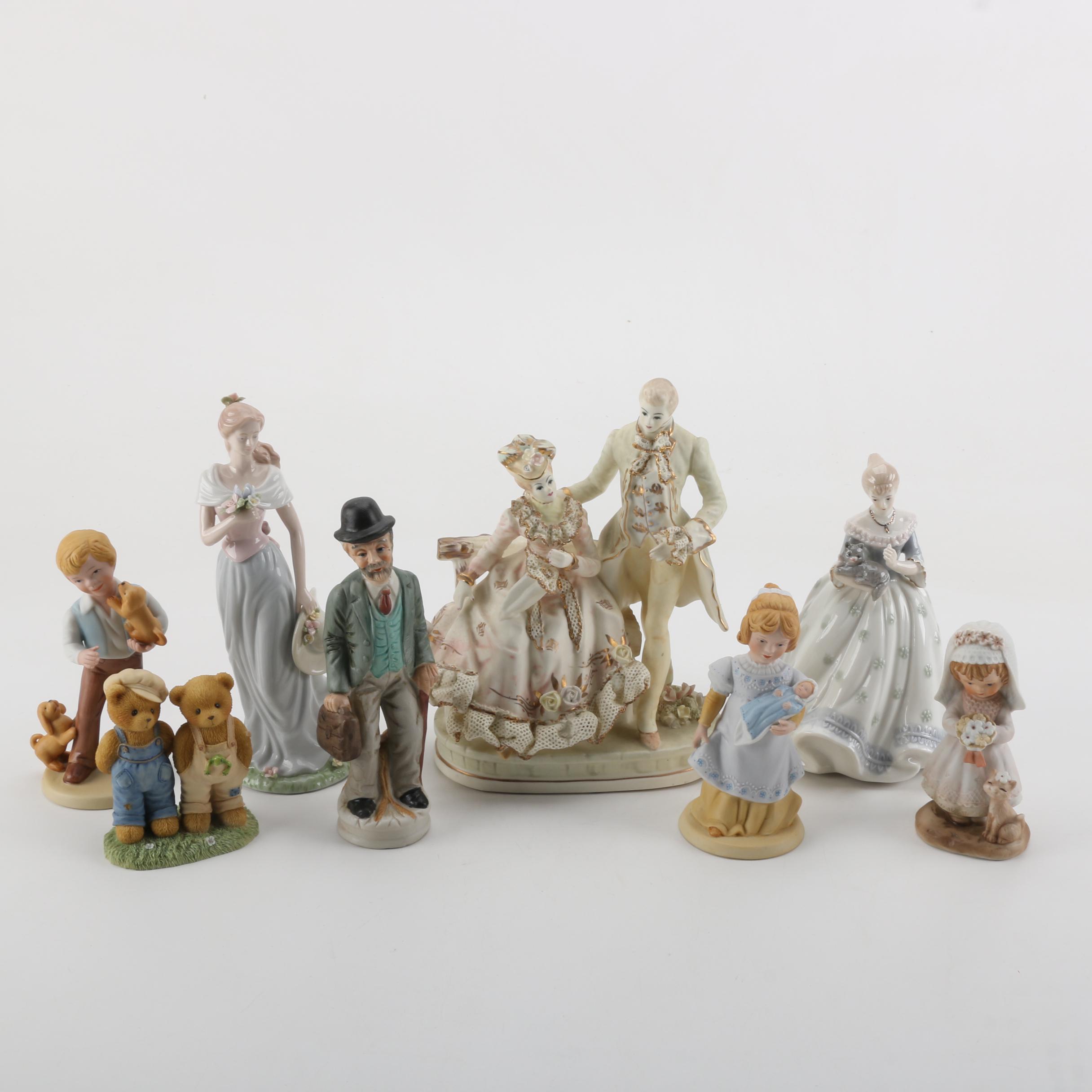 Porcelain Figurines of Men, Women, and Children