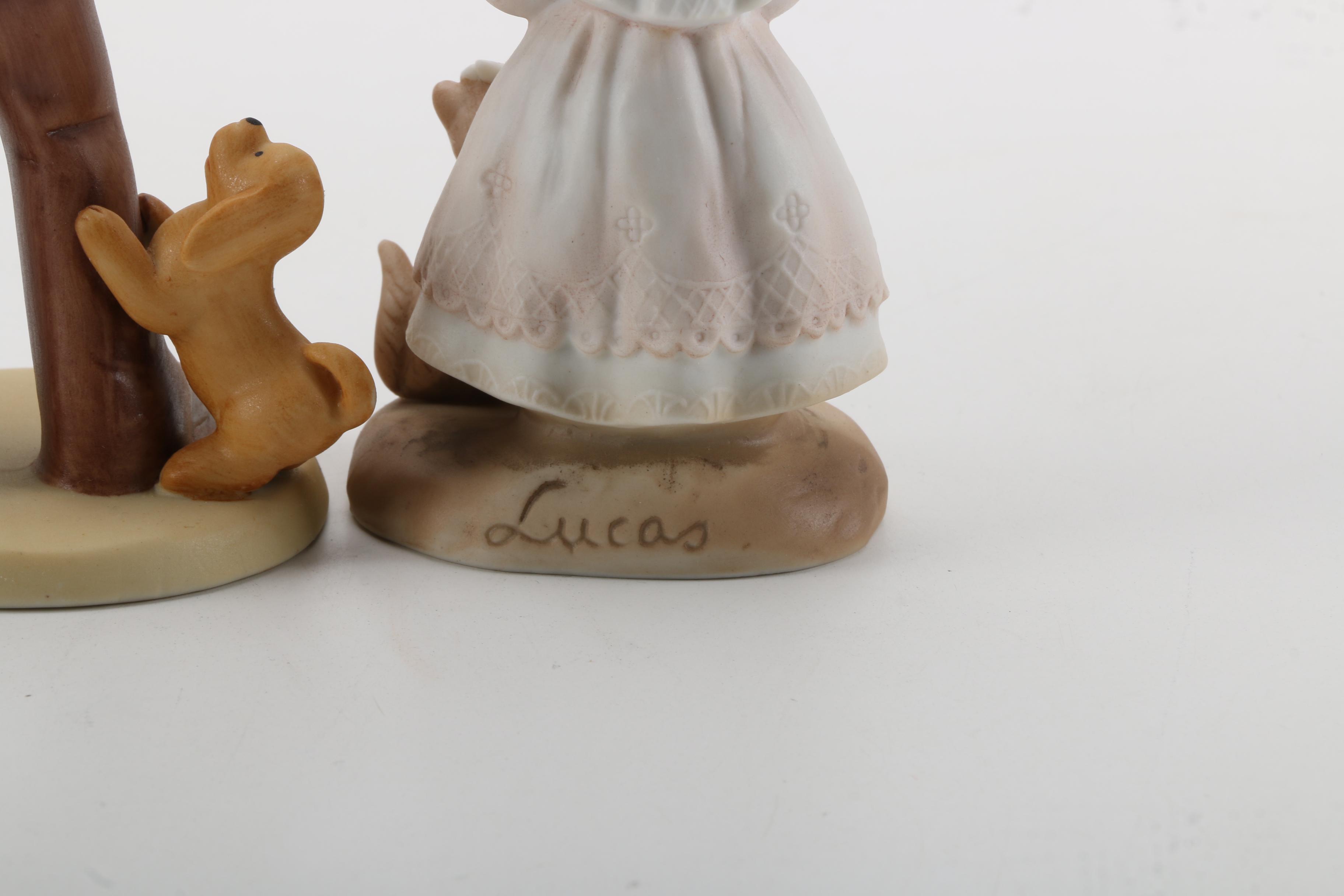 Porcelain Figurines of Men, Women, and Children