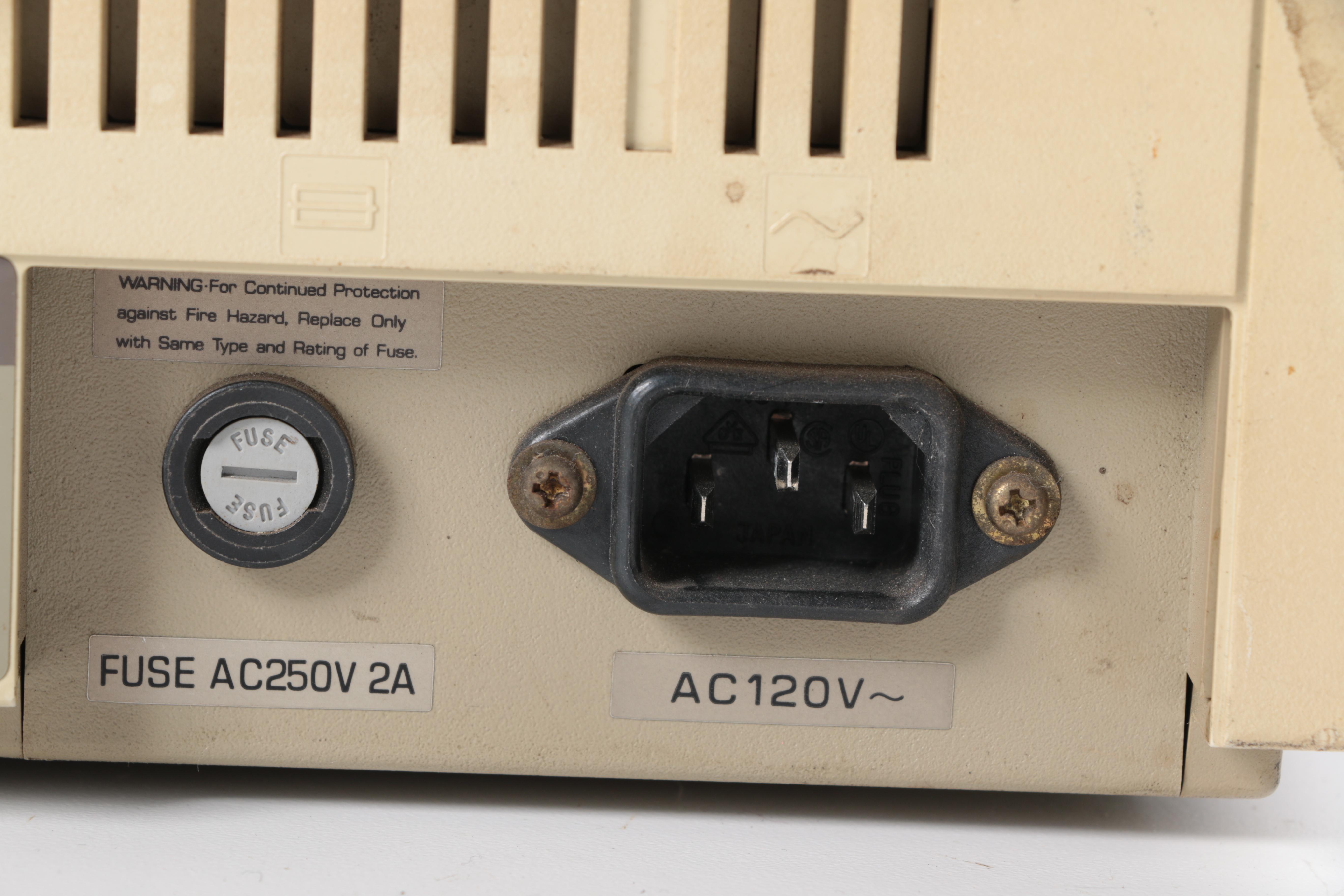 Vintage Apple IIe Computer with Accessories