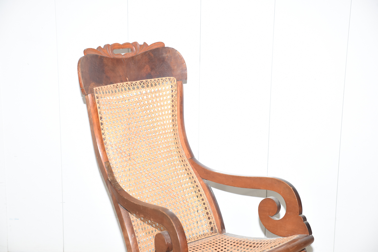 Wooden Cane Backed Rocking Chair by P. Gustine
