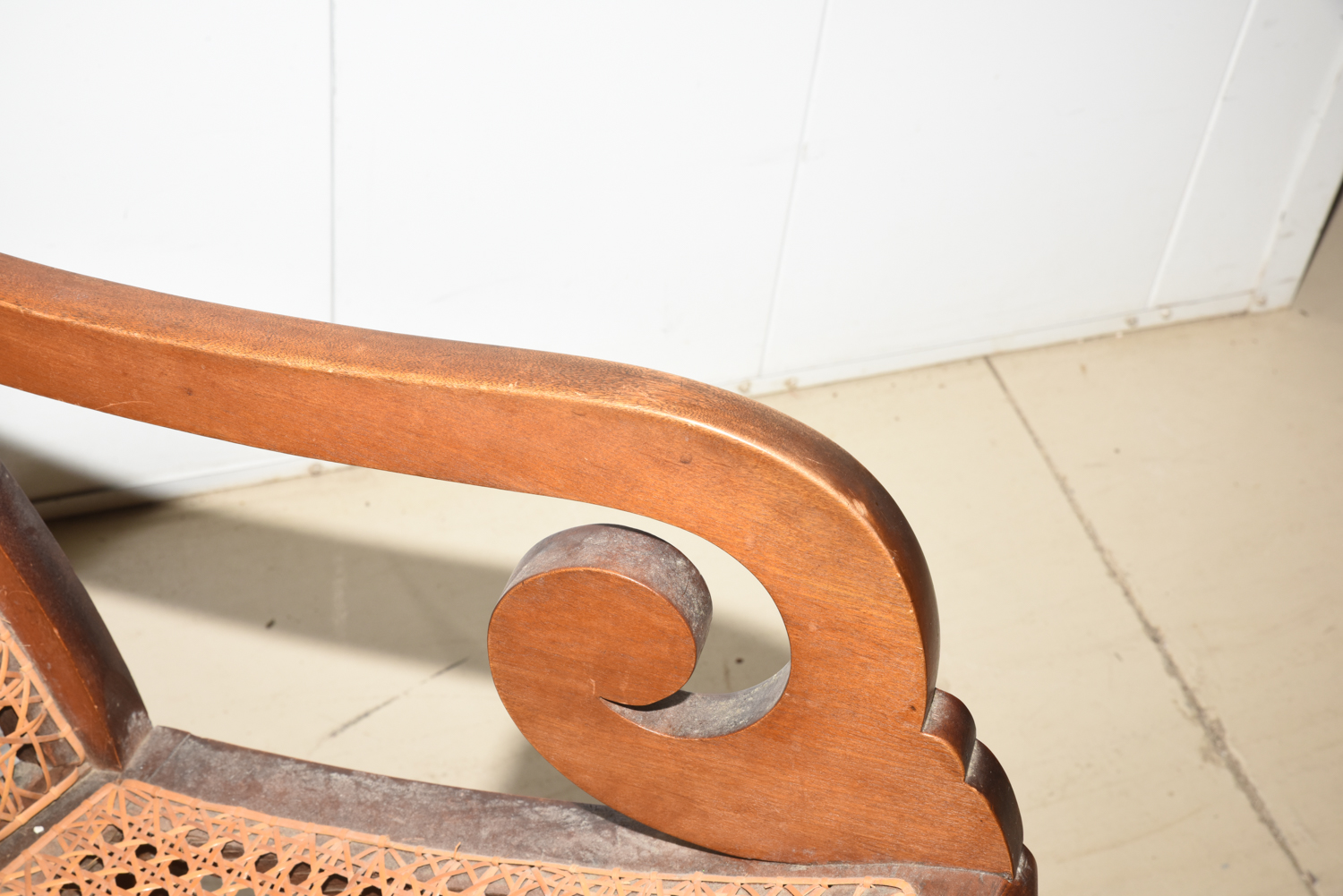 Wooden Cane Backed Rocking Chair by P. Gustine