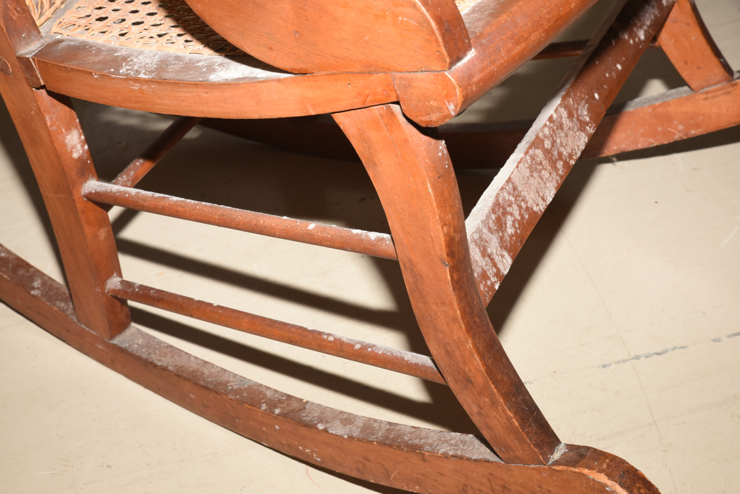 Wooden Cane Backed Rocking Chair by P. Gustine