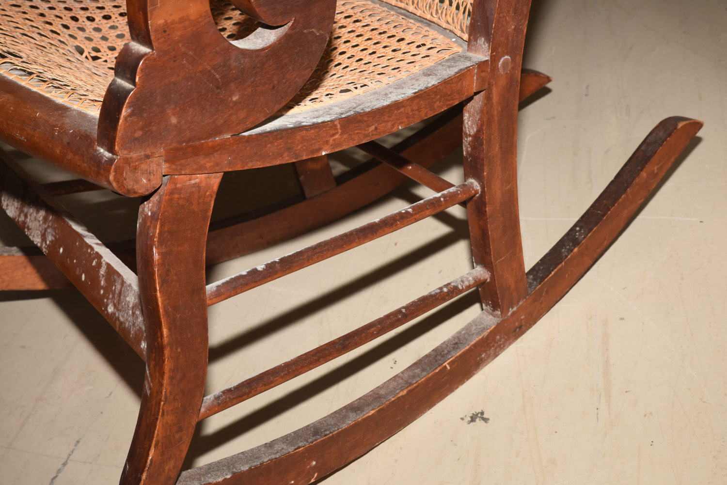 Wooden Cane Backed Rocking Chair by P. Gustine