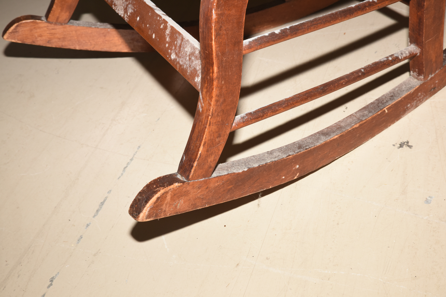 Wooden Cane Backed Rocking Chair by P. Gustine