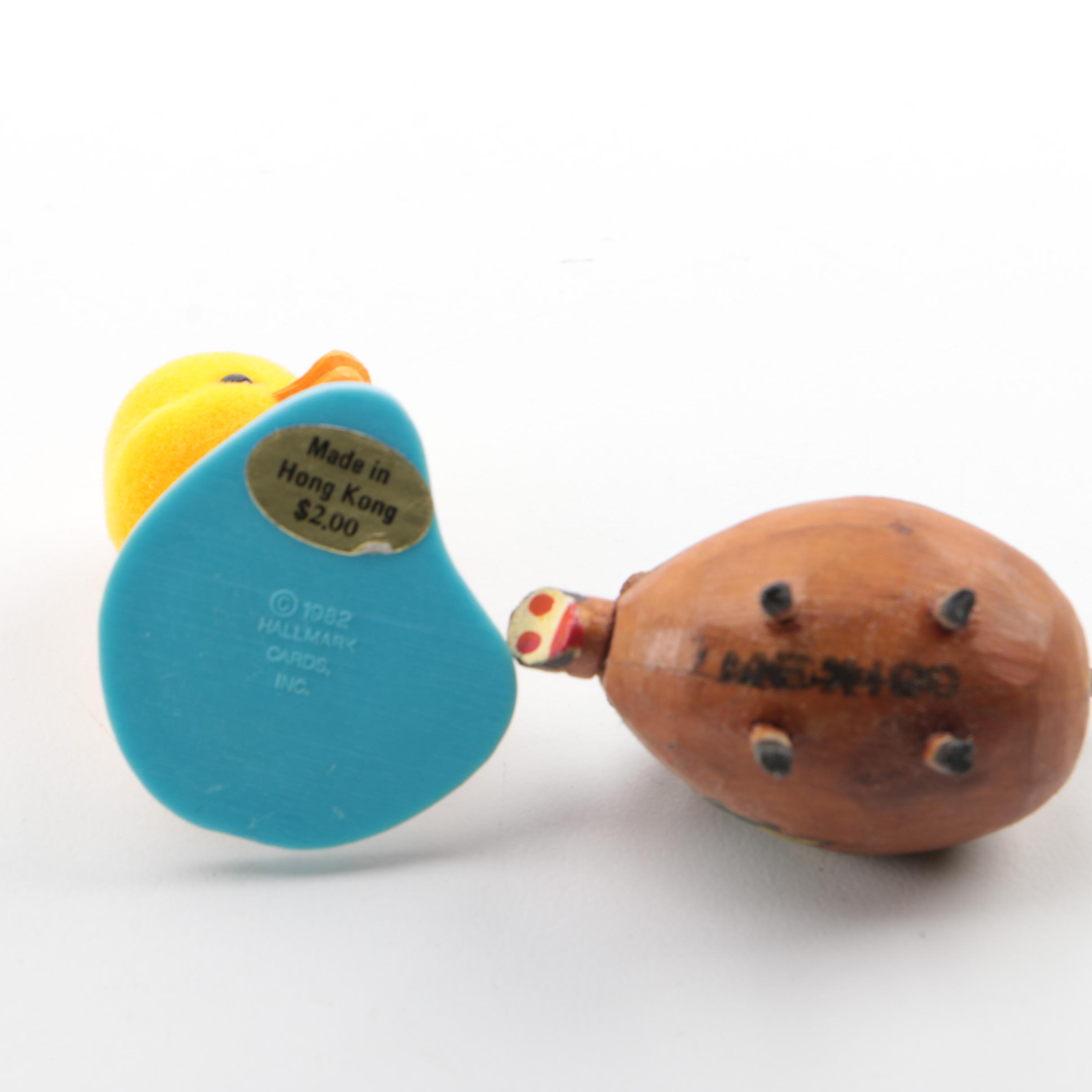 Vintage Figurines Featuring Goebel and a Display Shelf