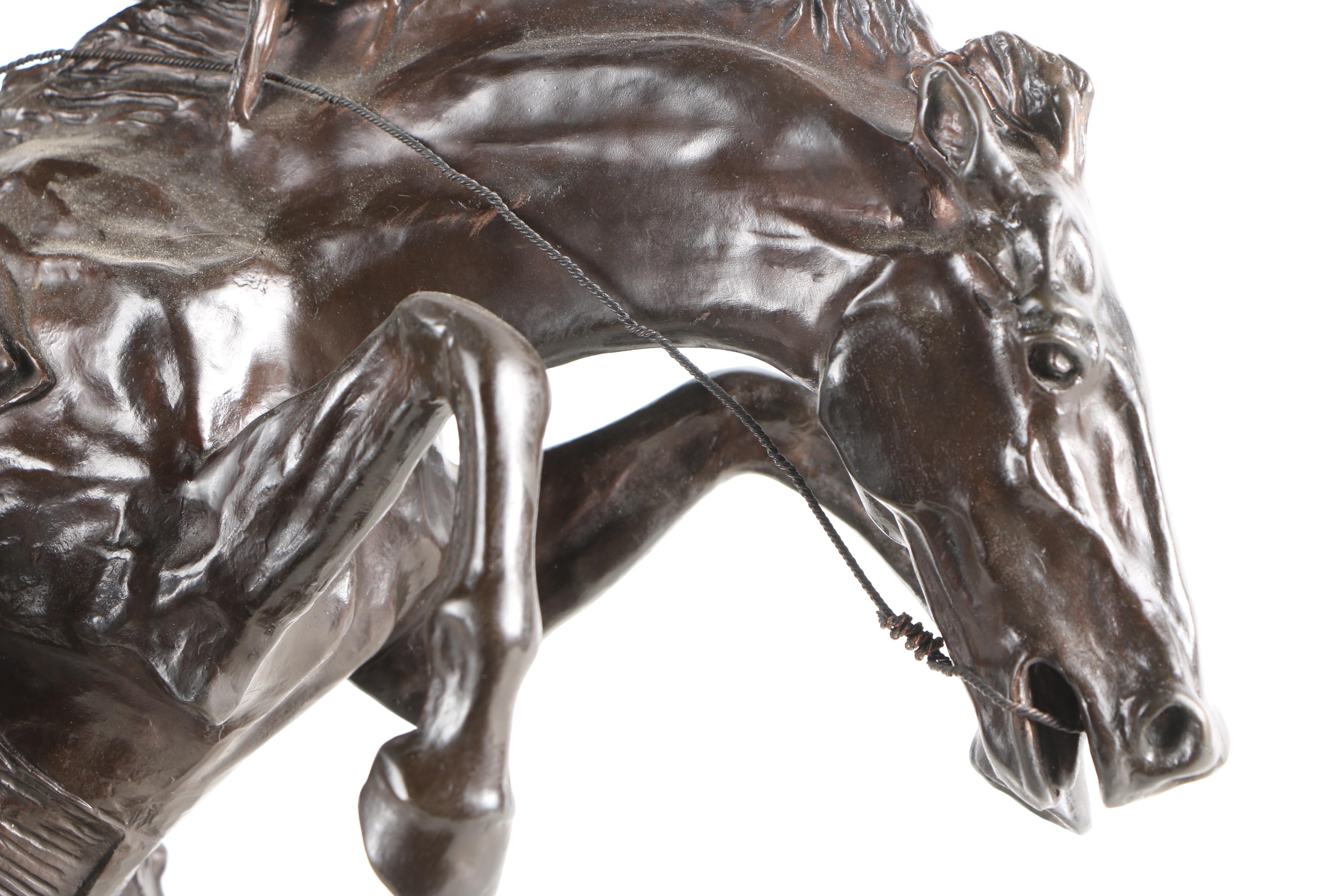 Bronze Reproduction Sculpture After Frederic Remington "Bronco Buster"