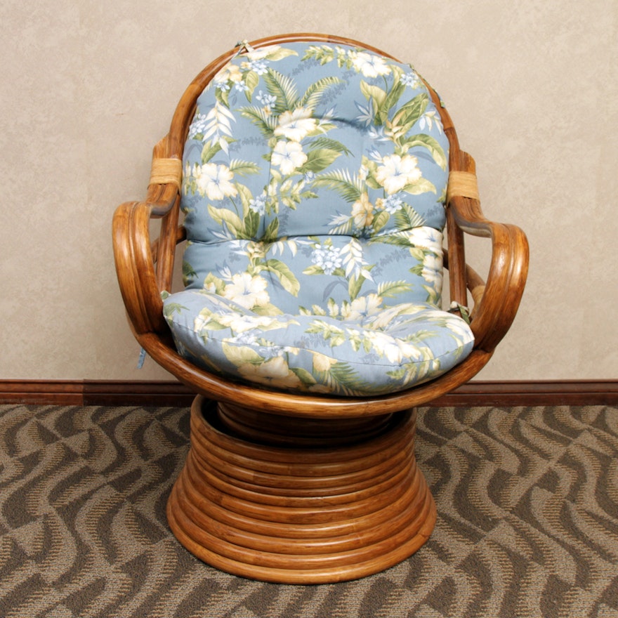 Rattan Swivel Chair with Floral Cushion