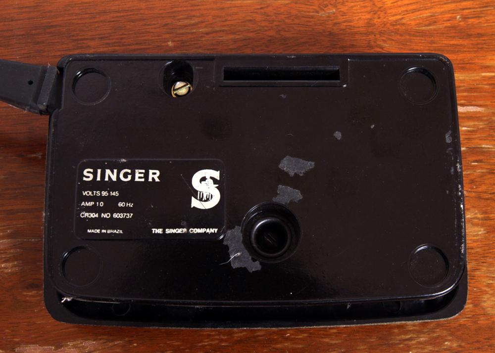 Singer Sewing Machine and Cabinet