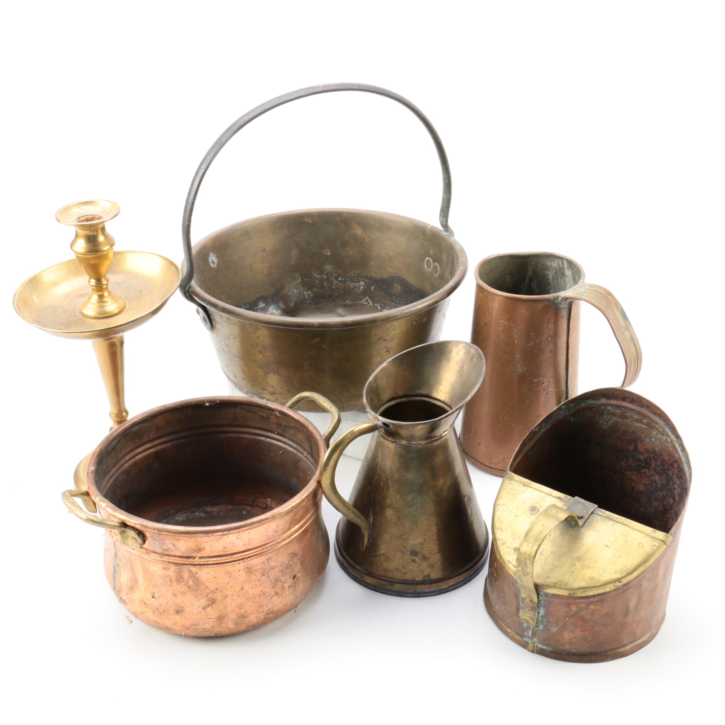 Brass and Copper Containers and a Candlestick