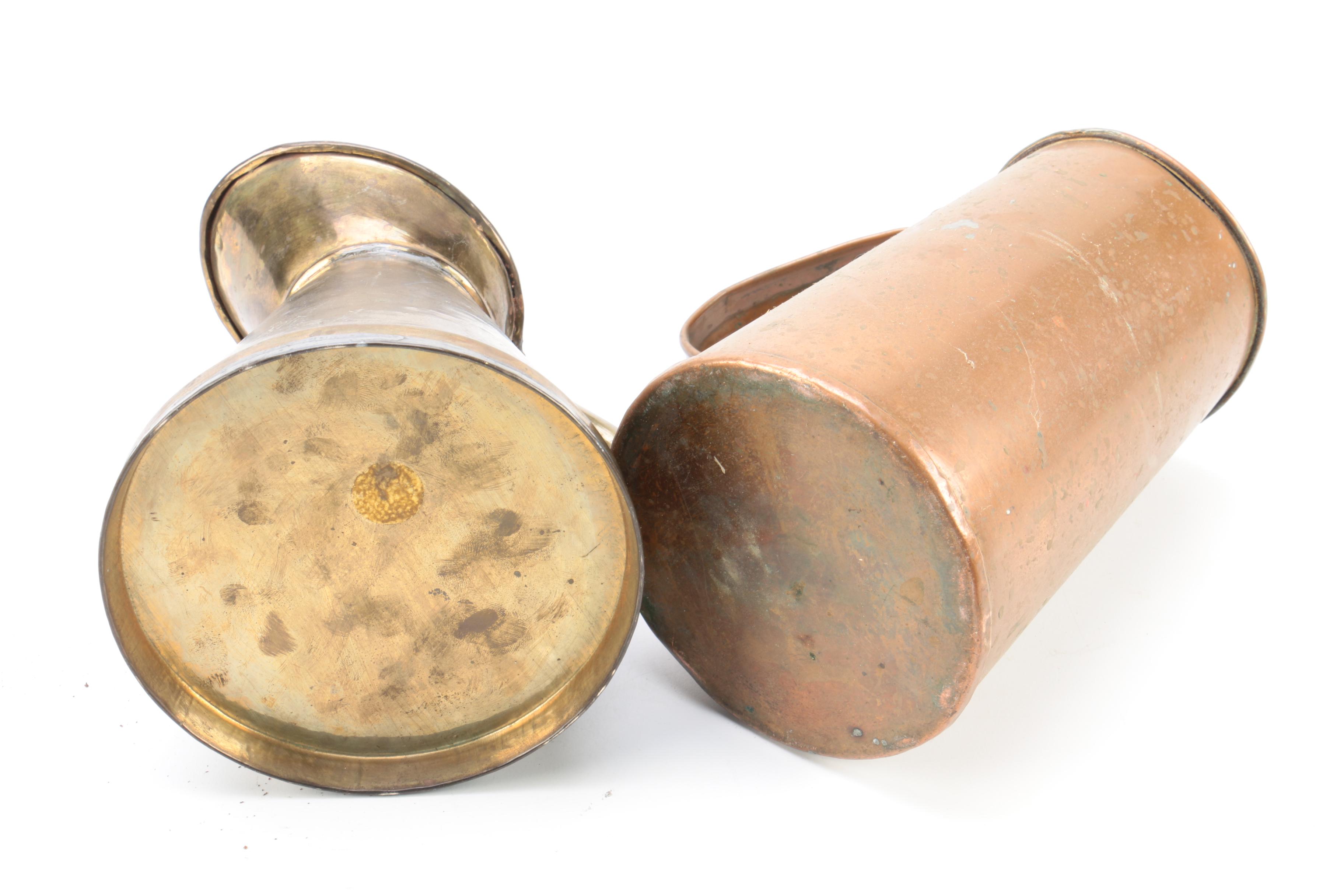 Brass and Copper Containers and a Candlestick