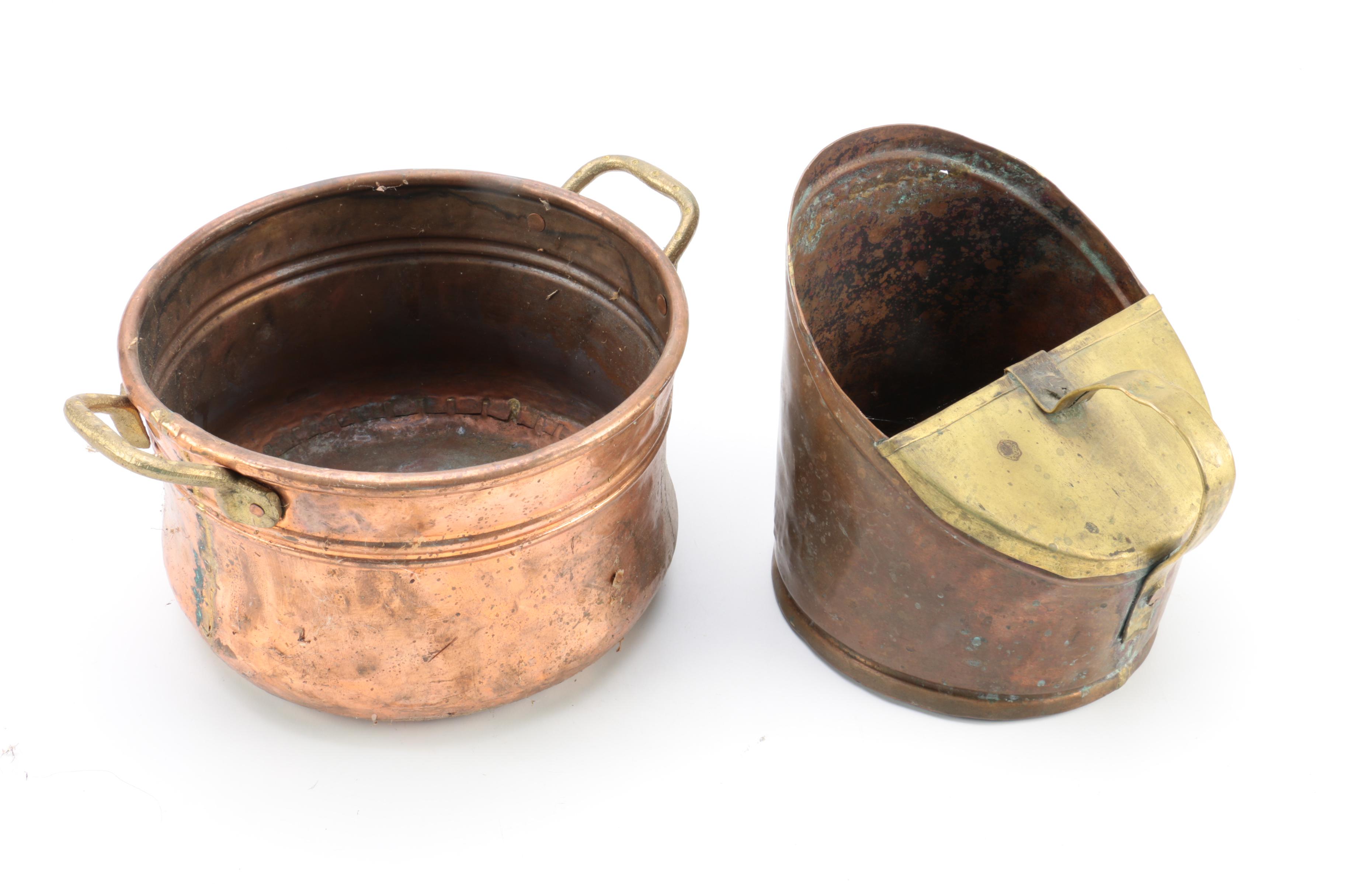 Brass and Copper Containers and a Candlestick