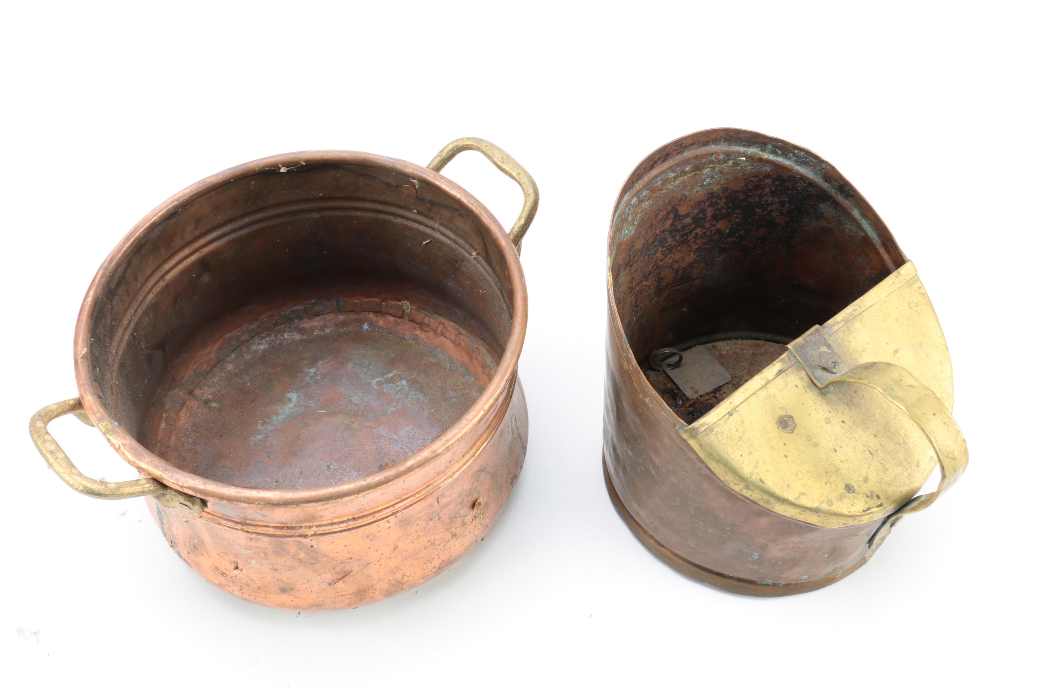 Brass and Copper Containers and a Candlestick