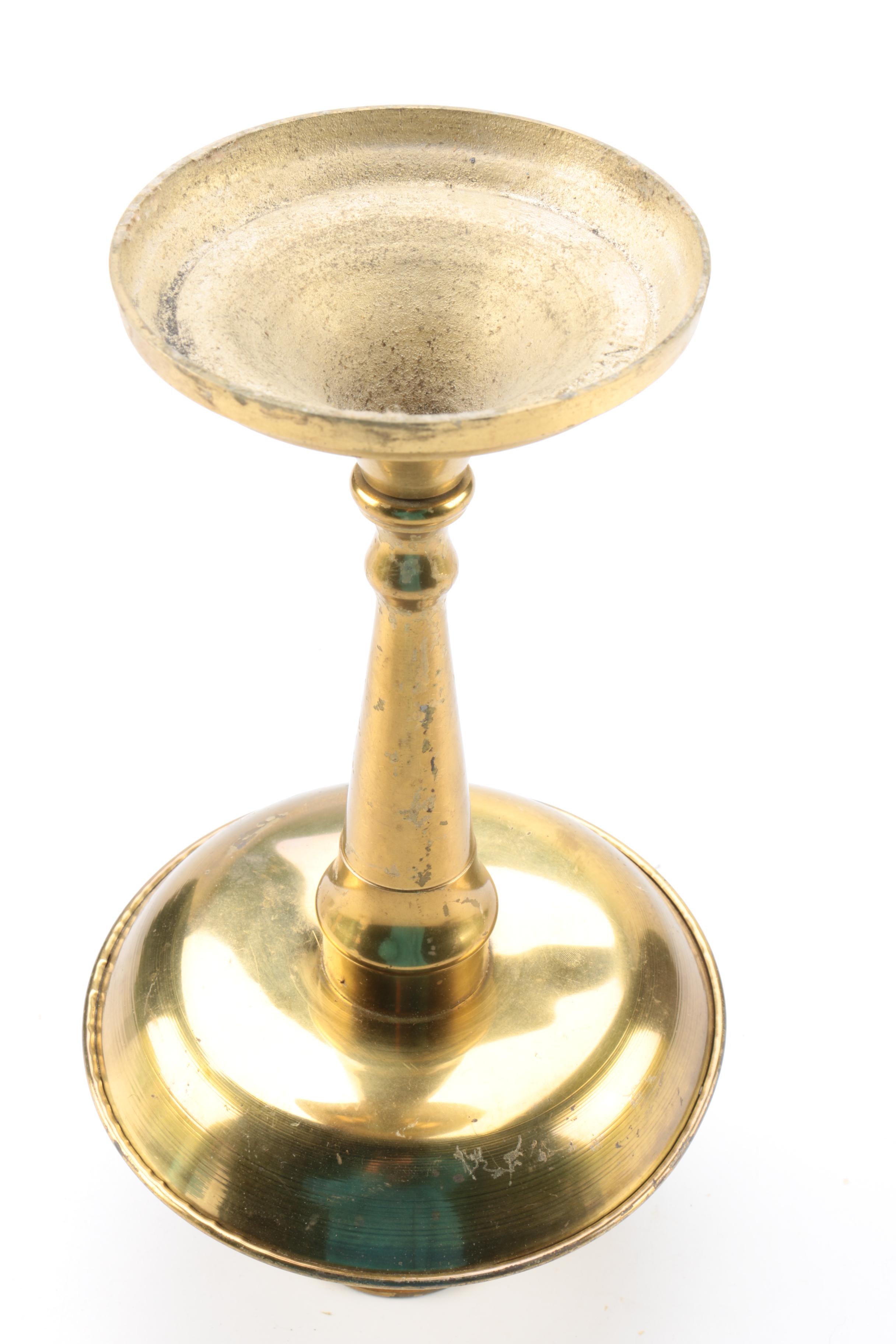 Brass and Copper Containers and a Candlestick