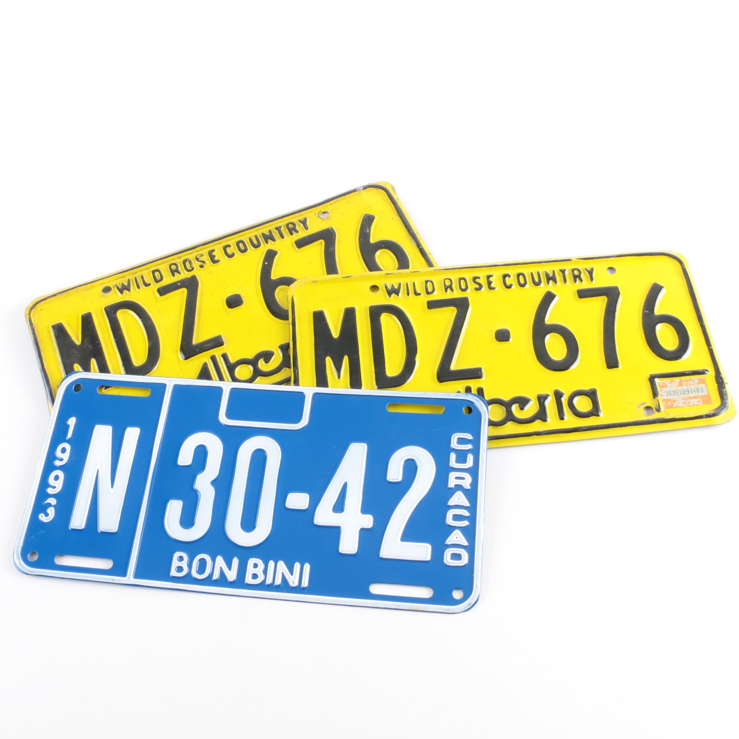 Alberta Canada and Curaçao License Plates