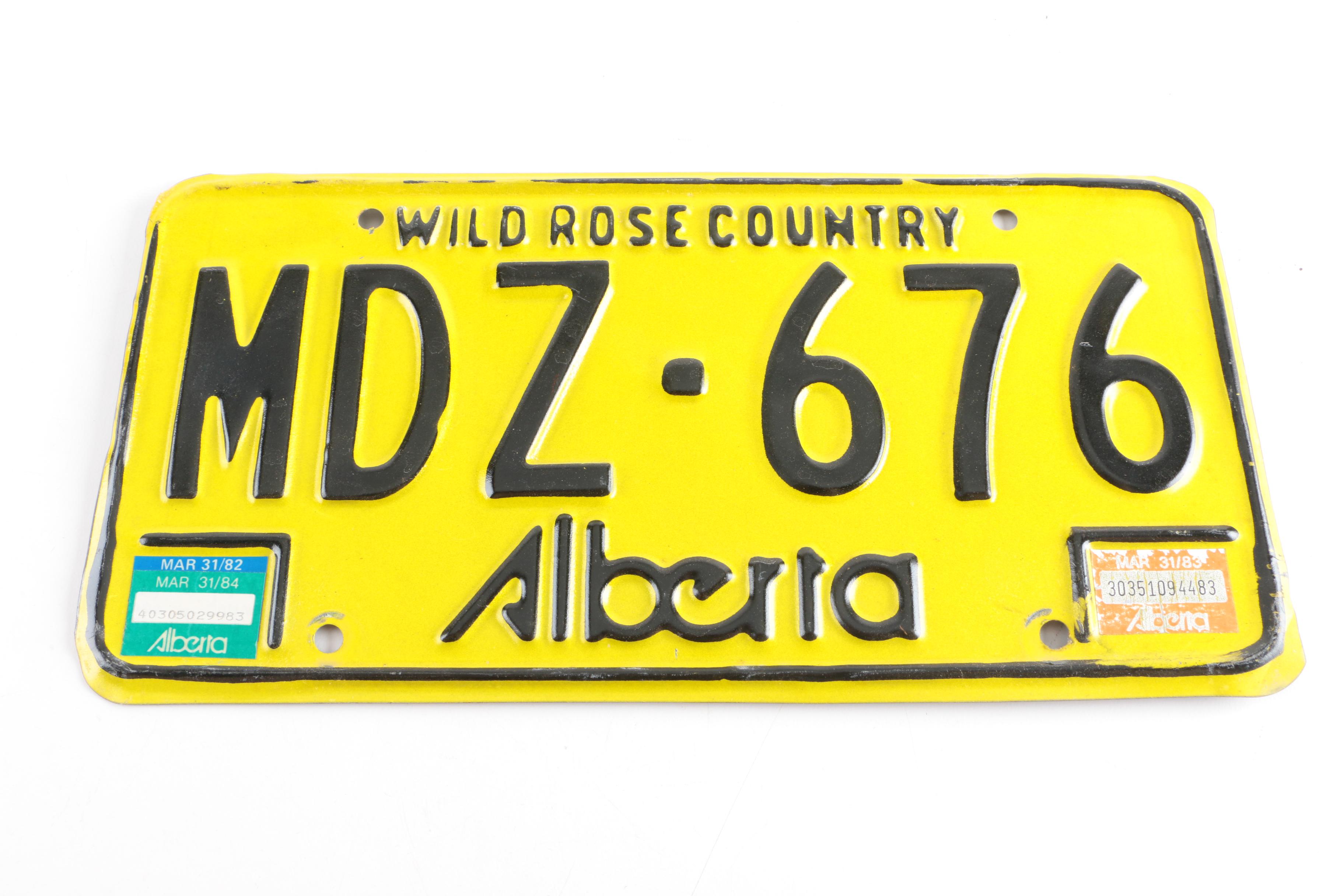 Alberta Canada and Curaçao License Plates