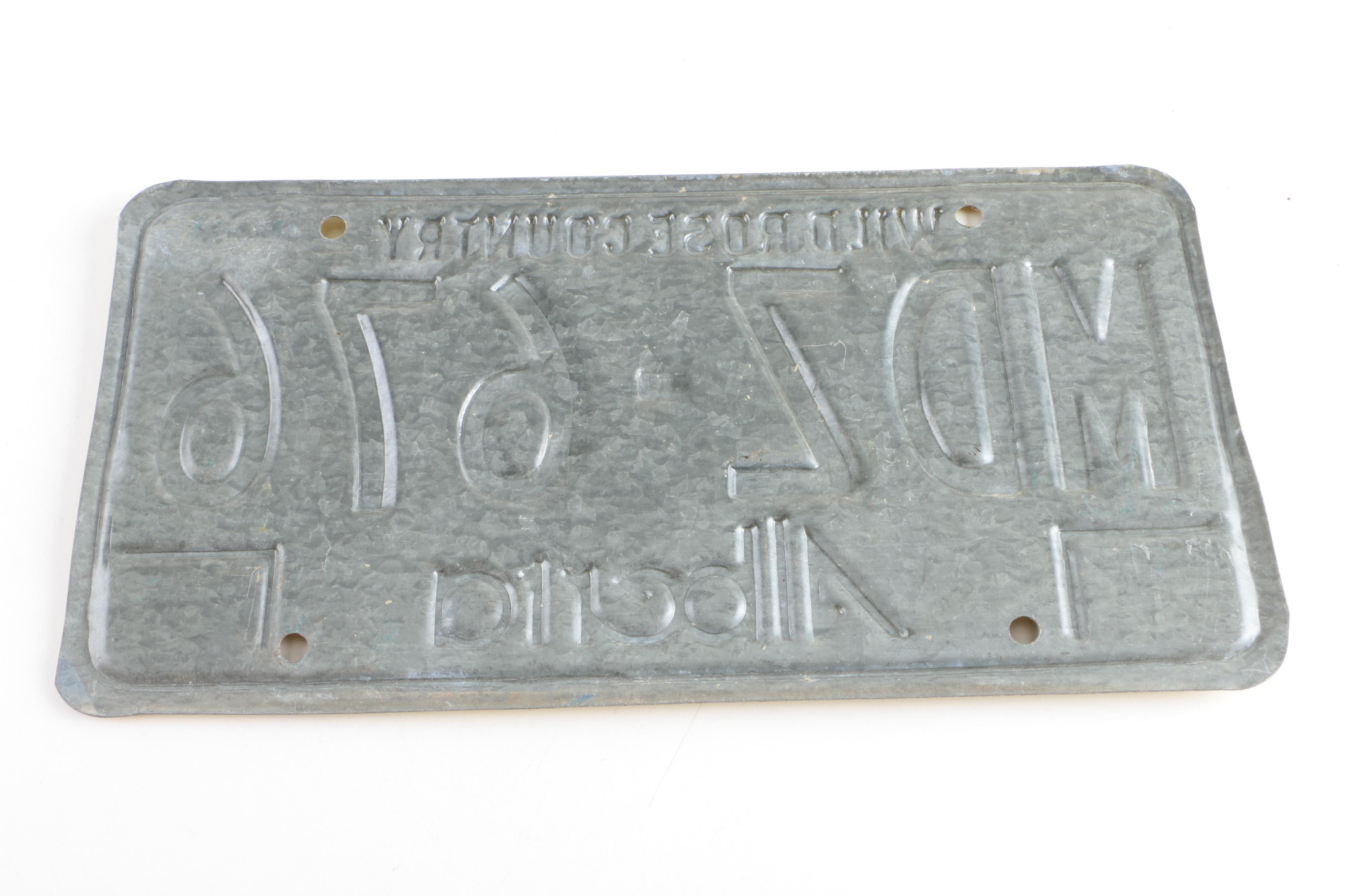 Alberta Canada and Curaçao License Plates