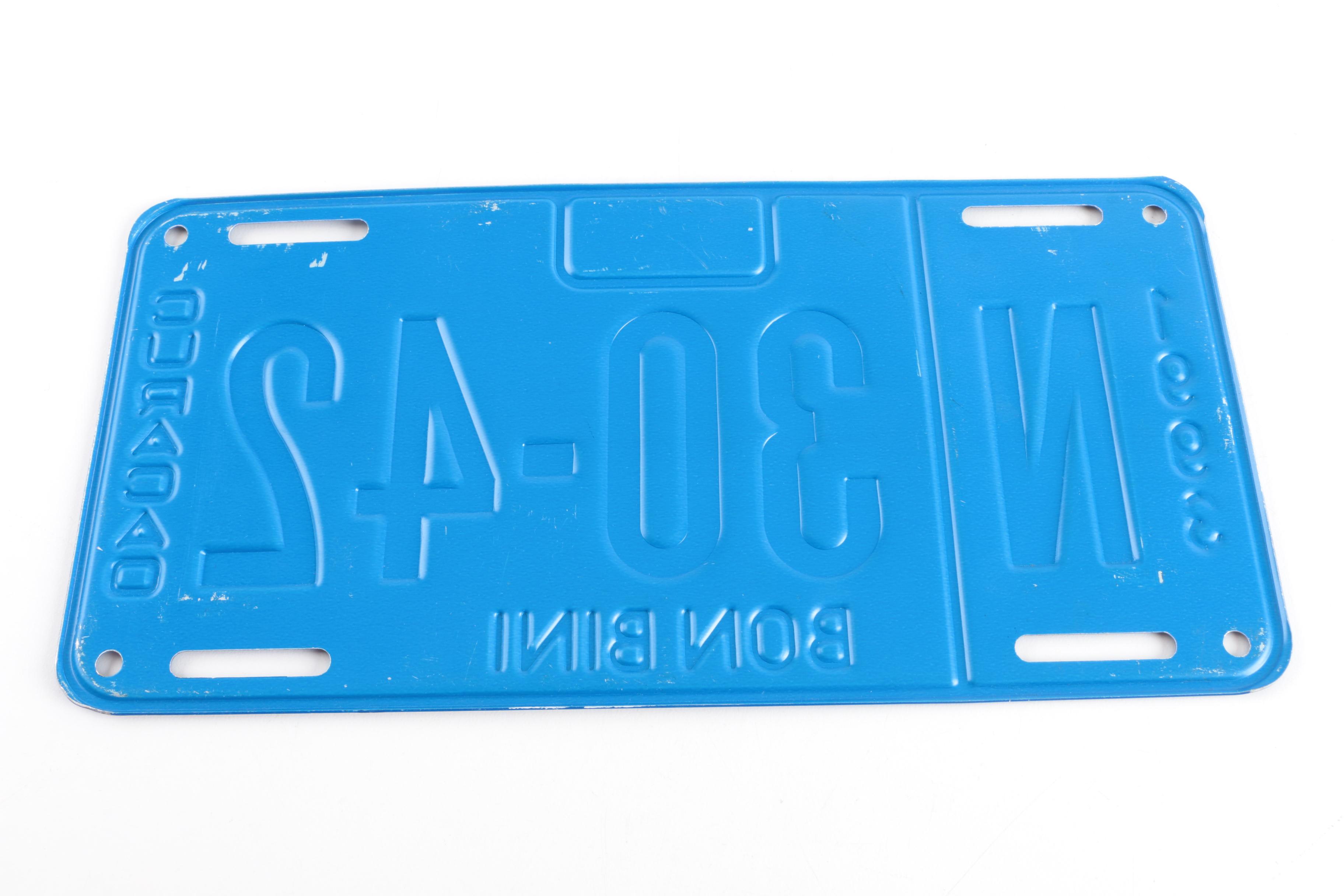 Alberta Canada and Curaçao License Plates