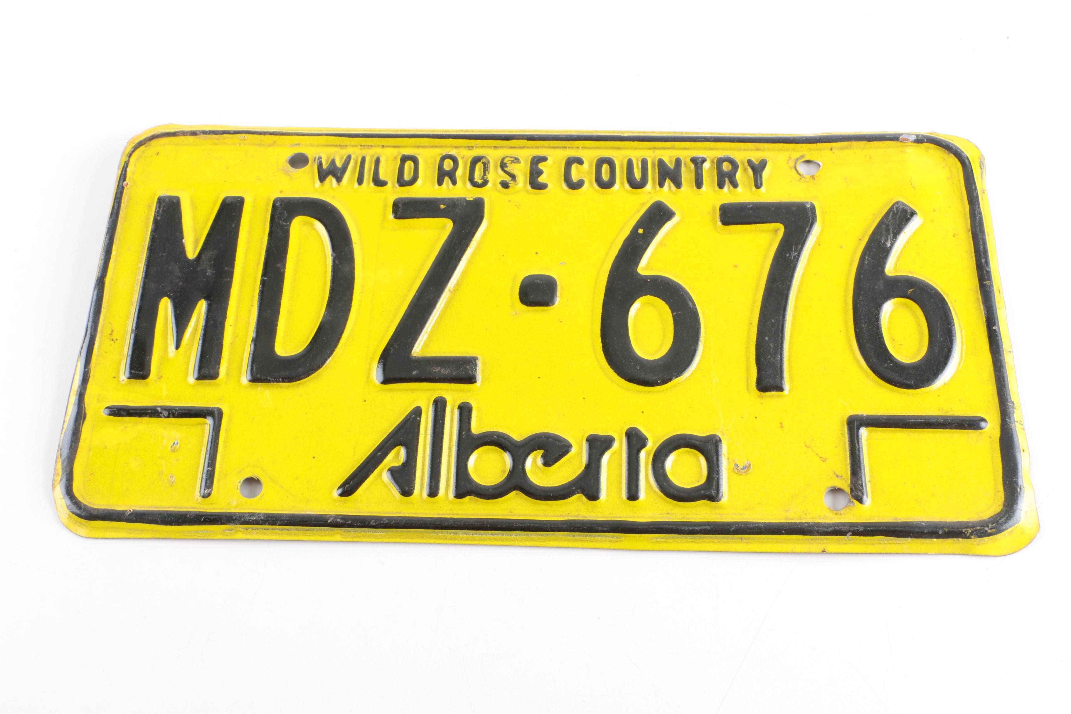 Alberta Canada and Curaçao License Plates