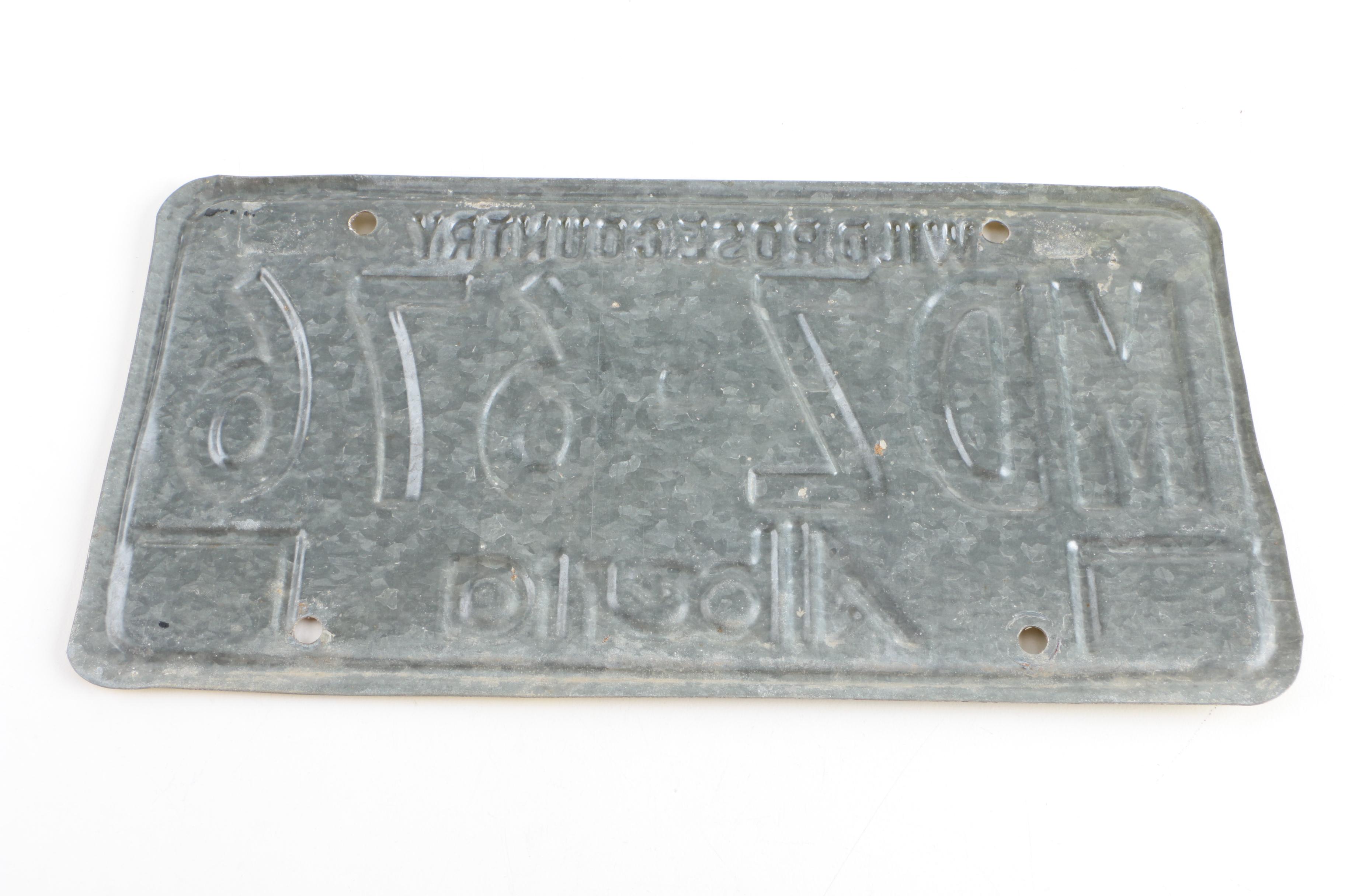 Alberta Canada and Curaçao License Plates