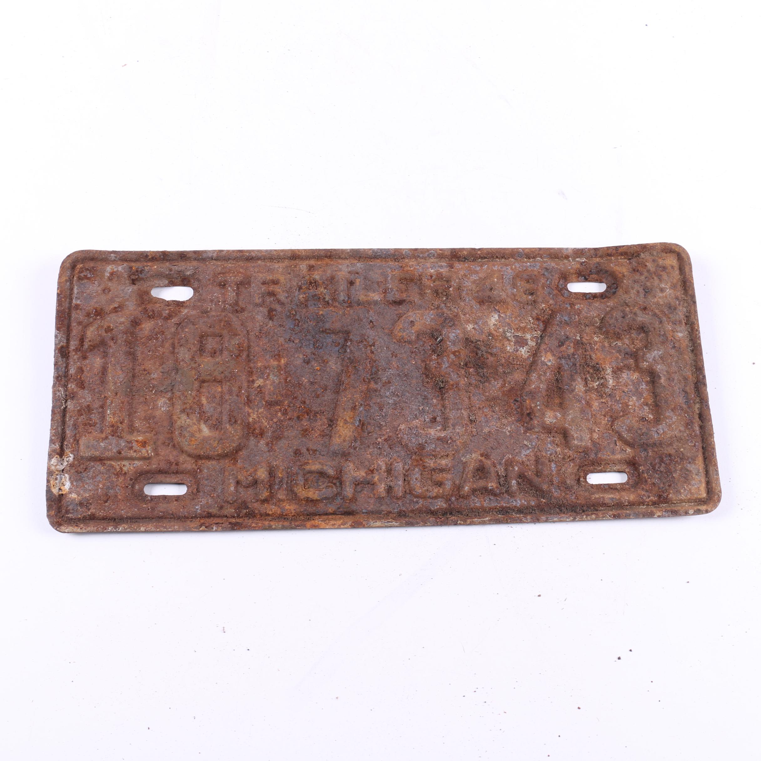 Vintage Florida and Michigan License Plates