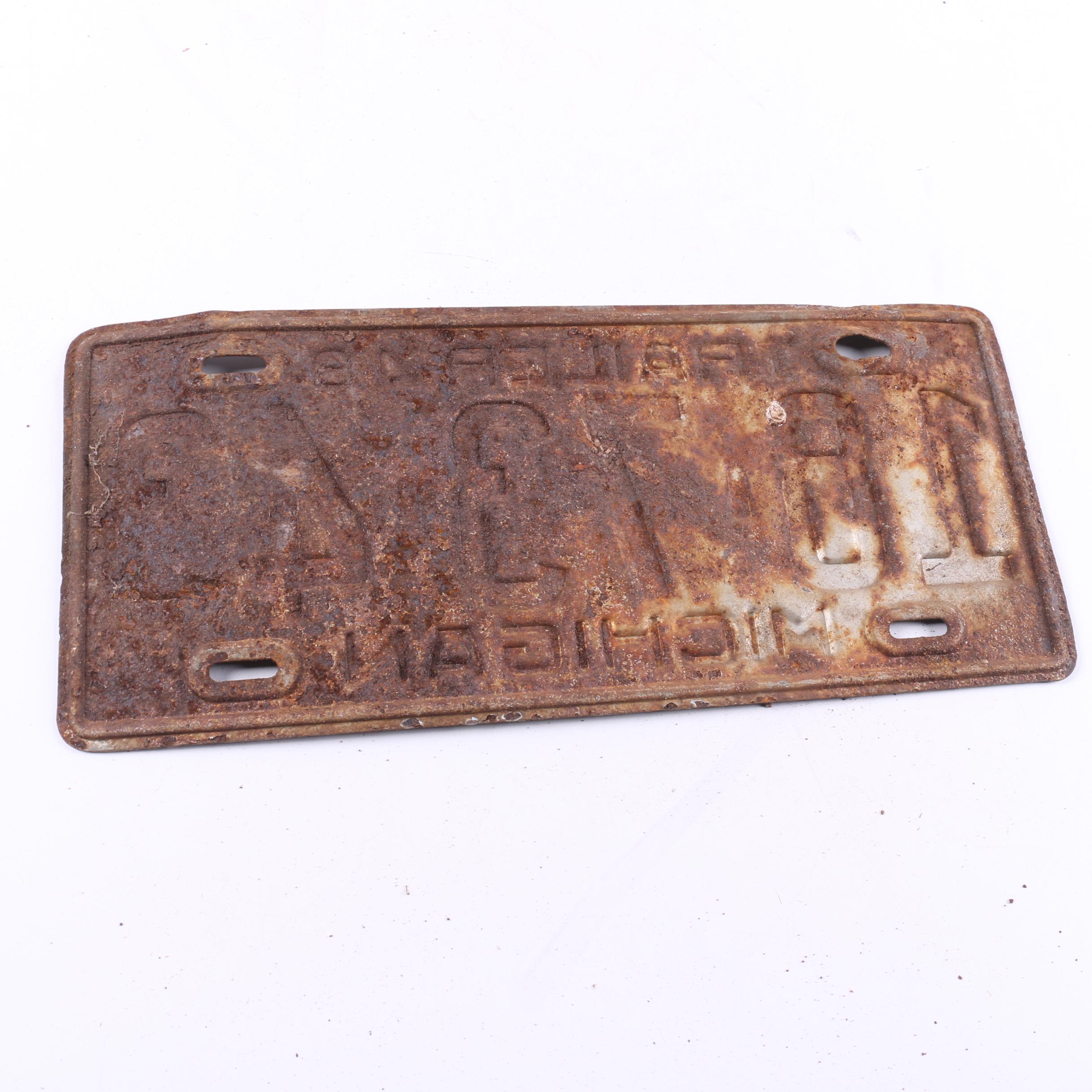 Vintage Florida and Michigan License Plates